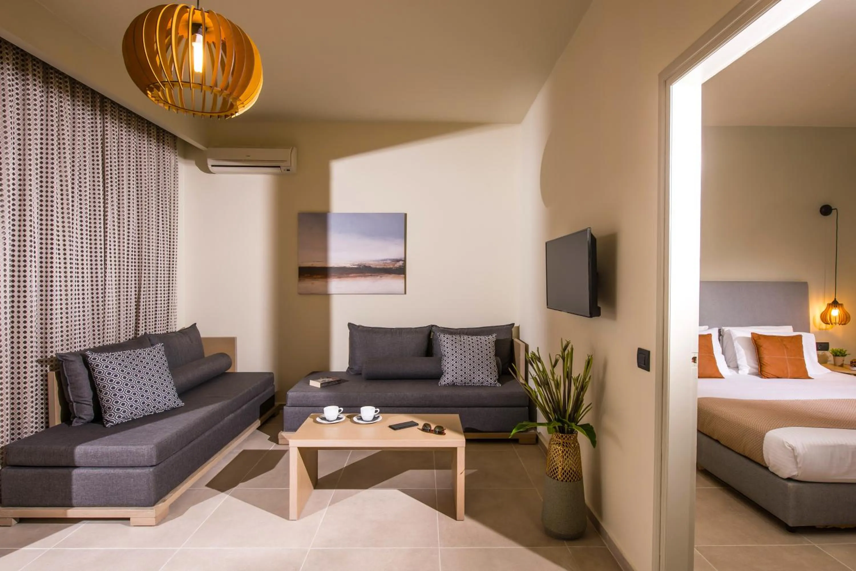 Seating area, Bed in Malena Hotel & Suites - Adults Only by Omilos Hotels