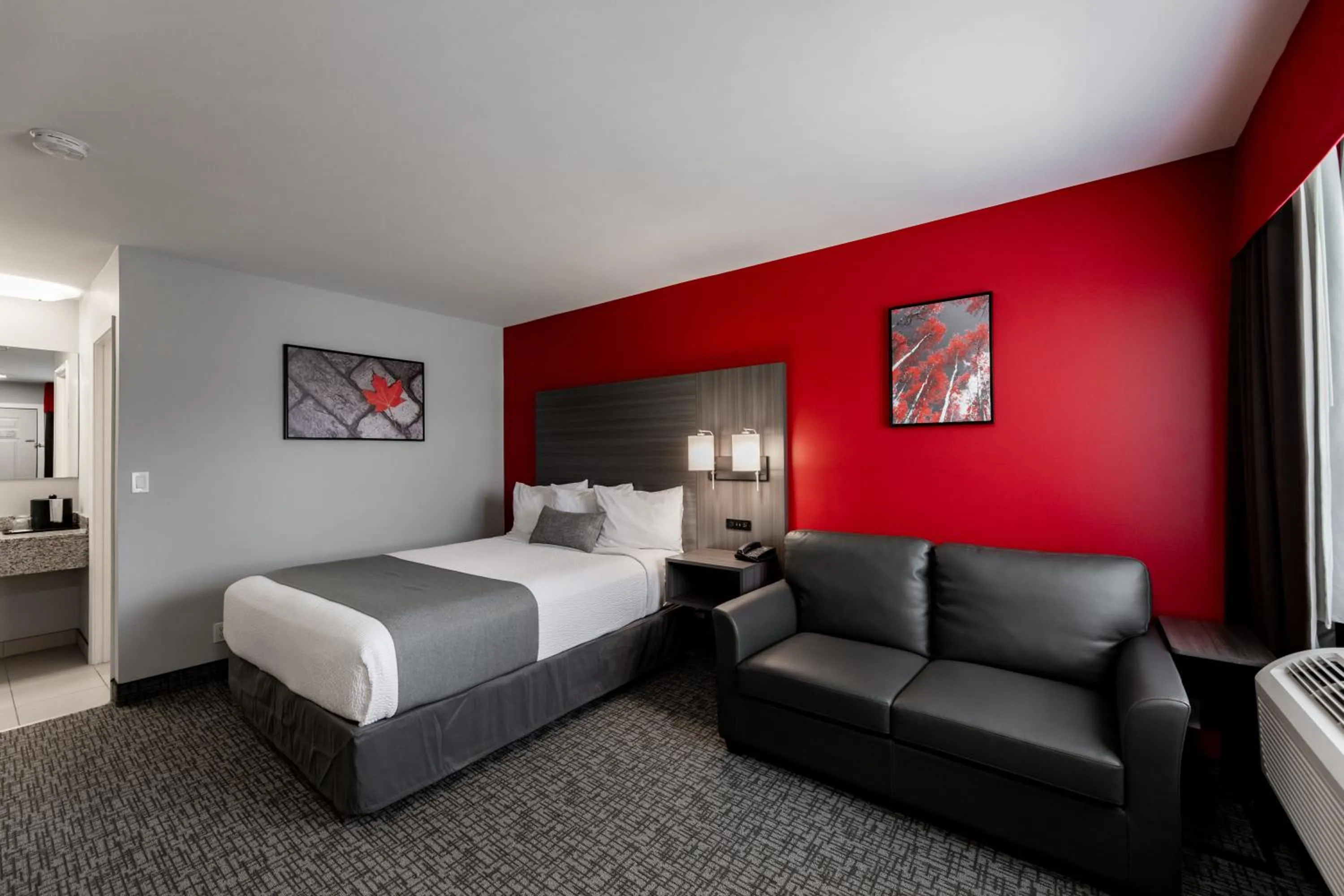 Bed in The Kanata by BCMInns - Hinton