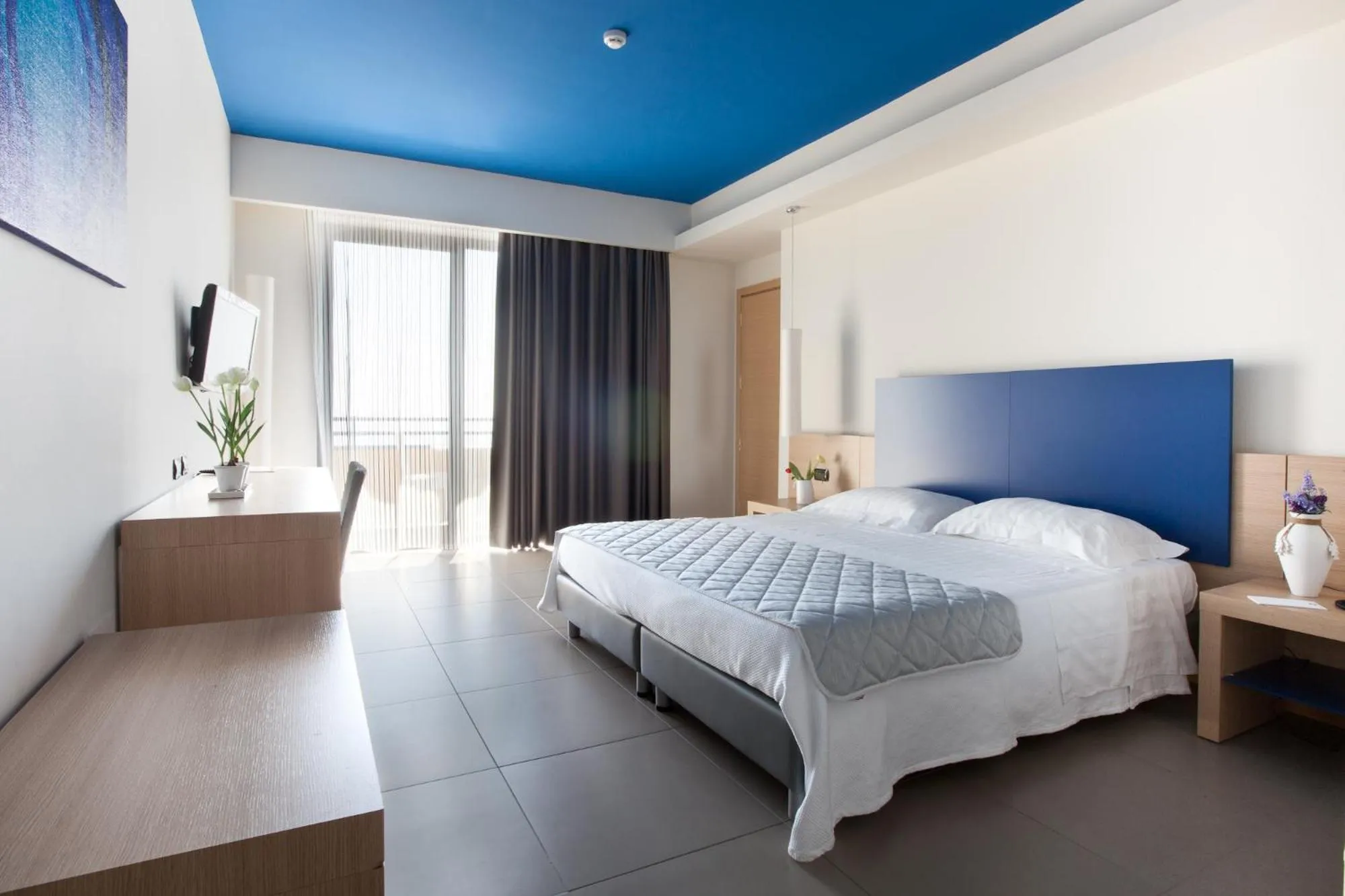 Bed in Esperia Palace Hotel & Resort Spa