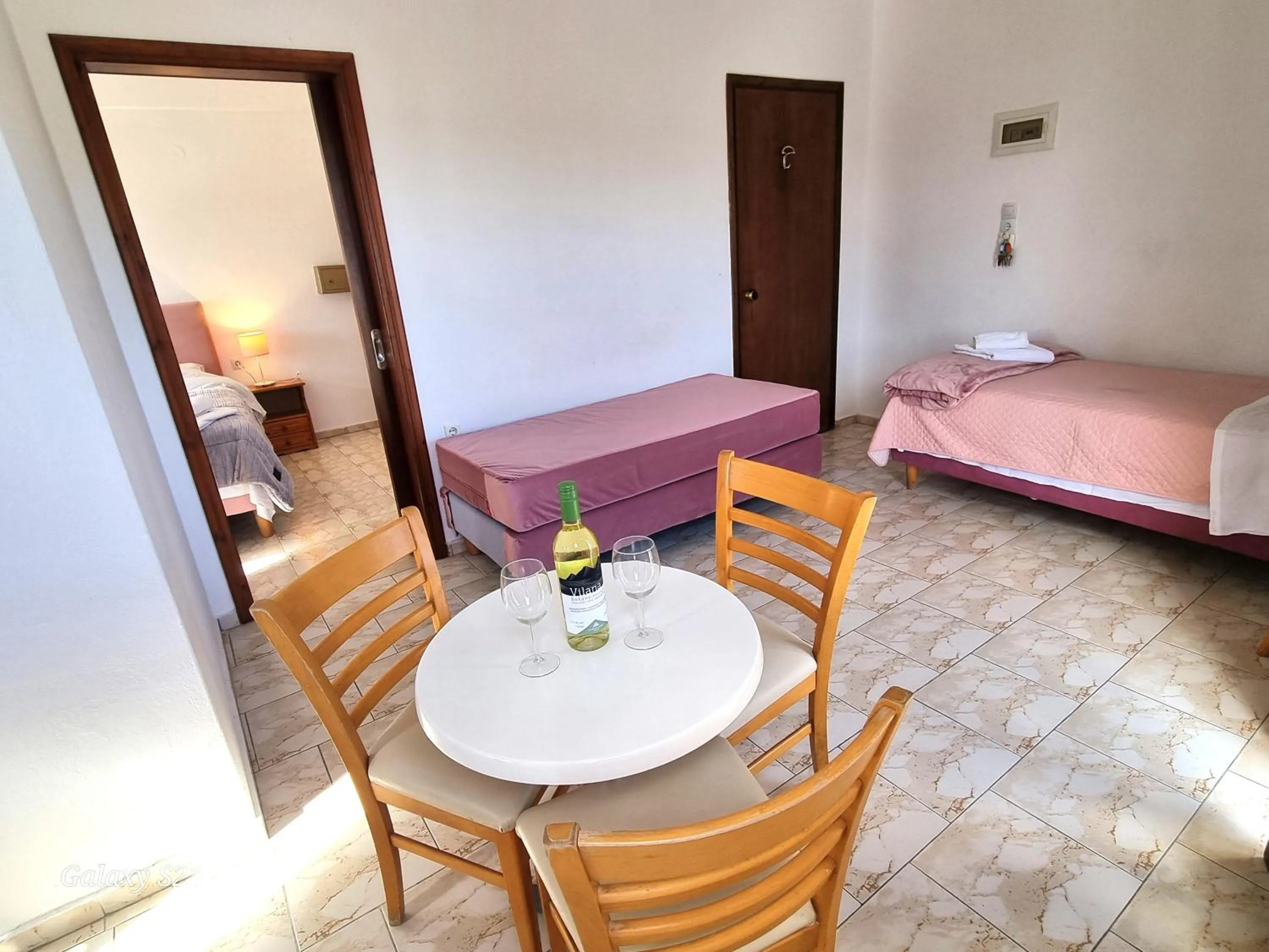Living room, Bed in Arhodiko Hotel
