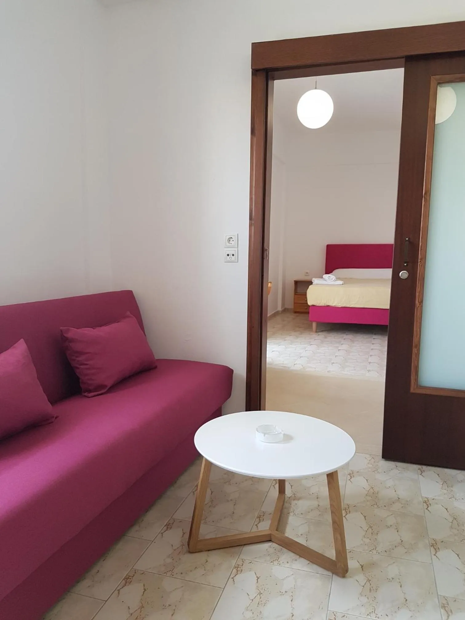 Seating area, Bed in Arhodiko Hotel