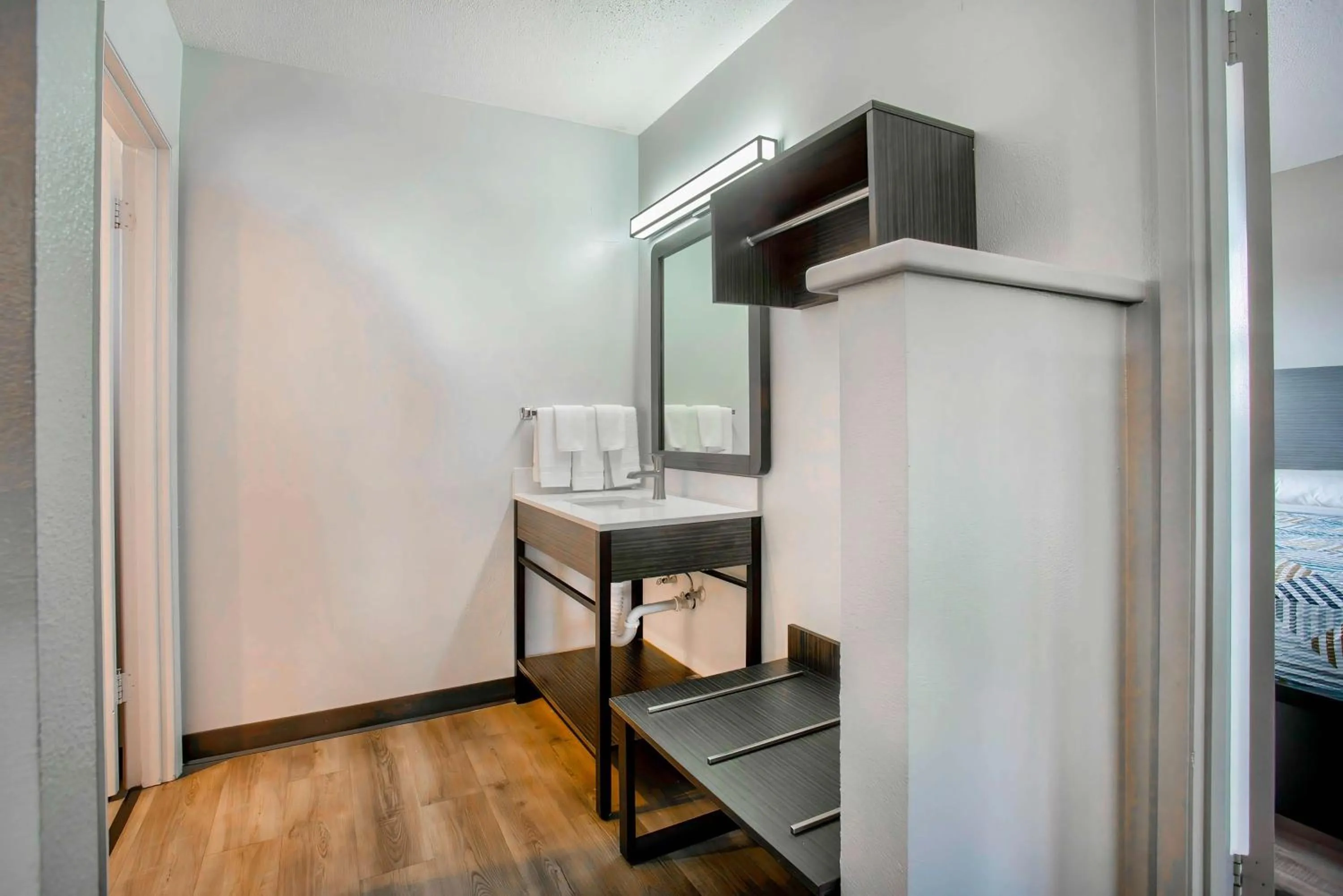 Bathroom, Bed in Motel 6-Bend, OR