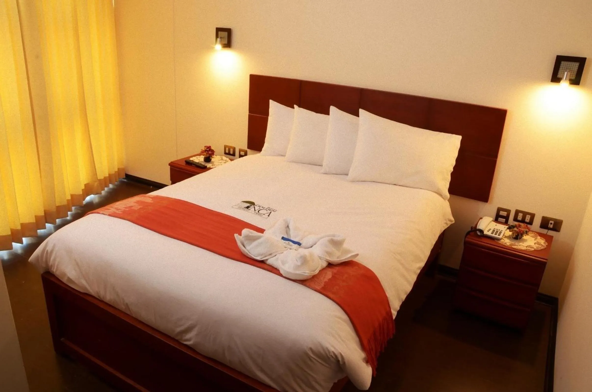 Bed in Golden Inca Hotel