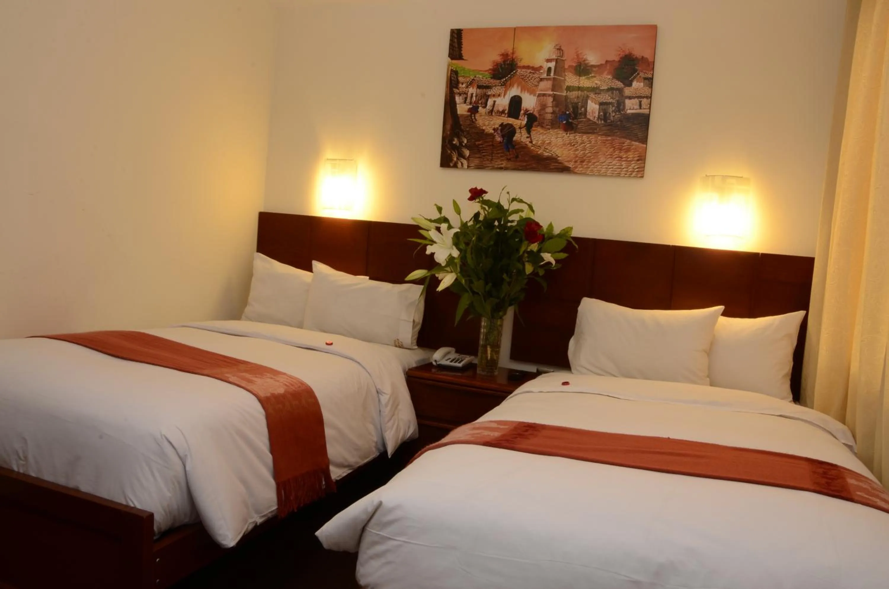 Bed in Golden Inca Hotel