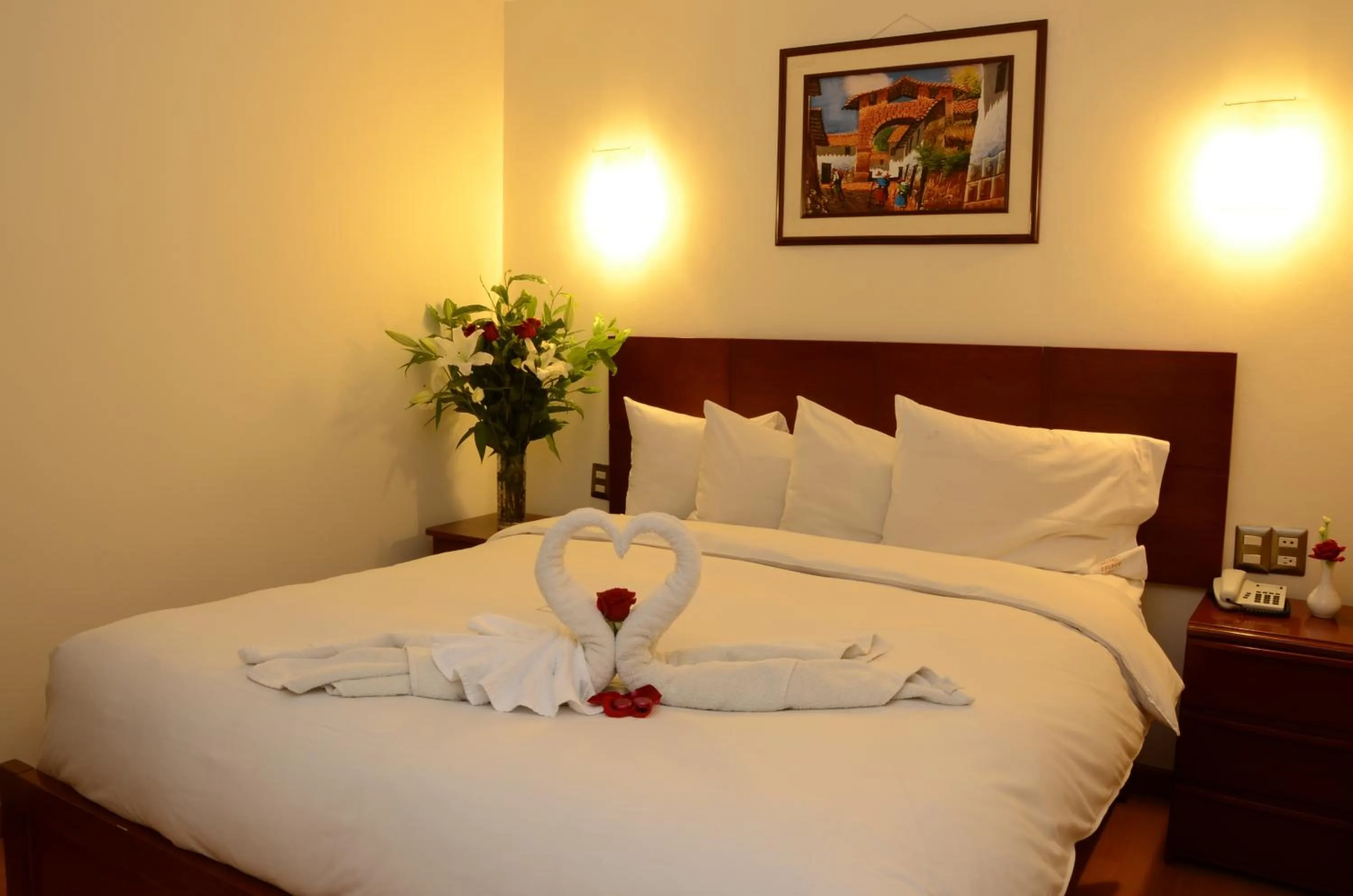 Bed in Golden Inca Hotel