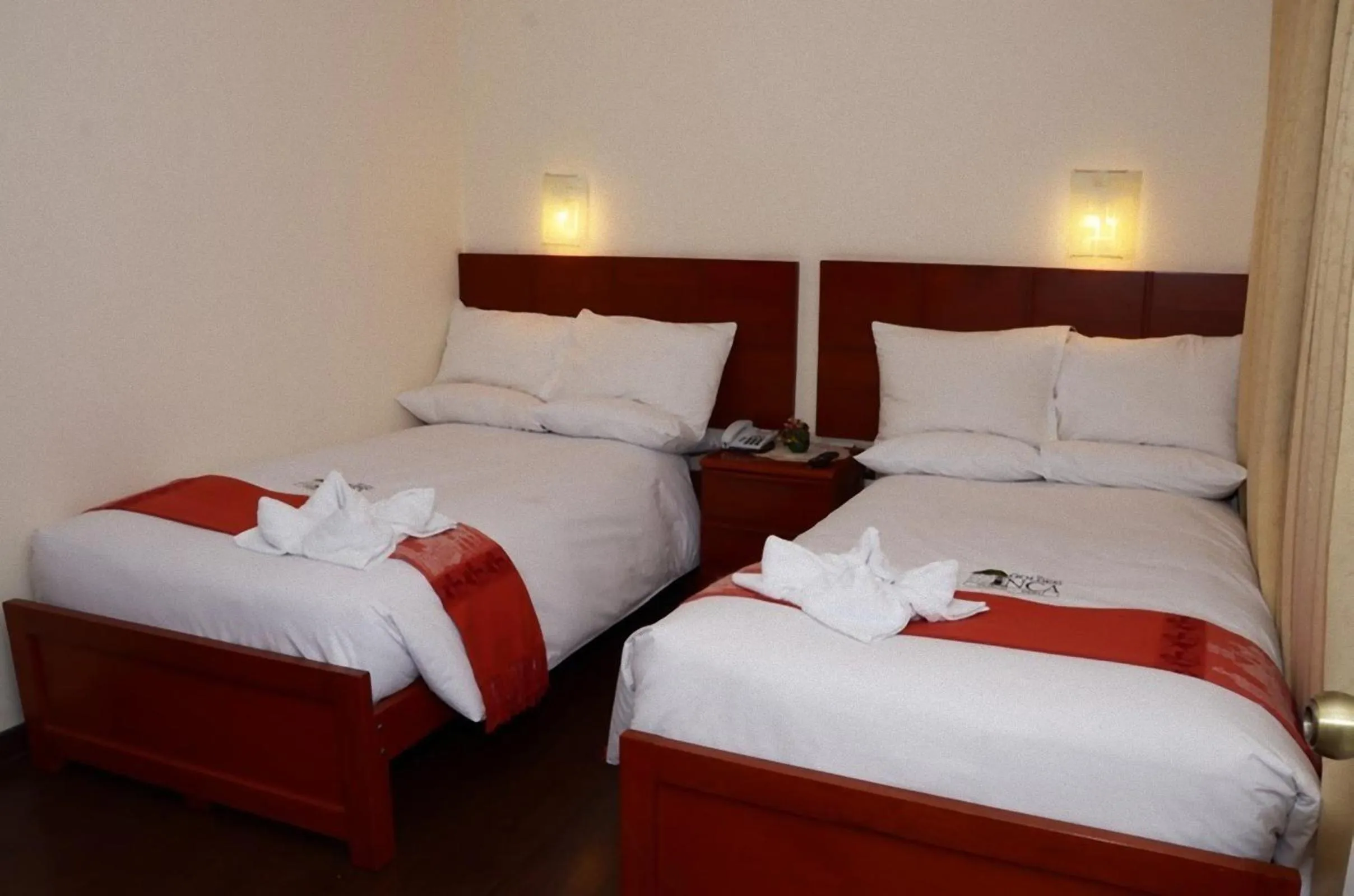 Bed in Golden Inca Hotel