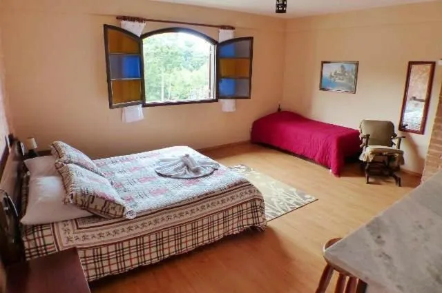 Photo of the whole room, Bed in Pousada da Brigida
