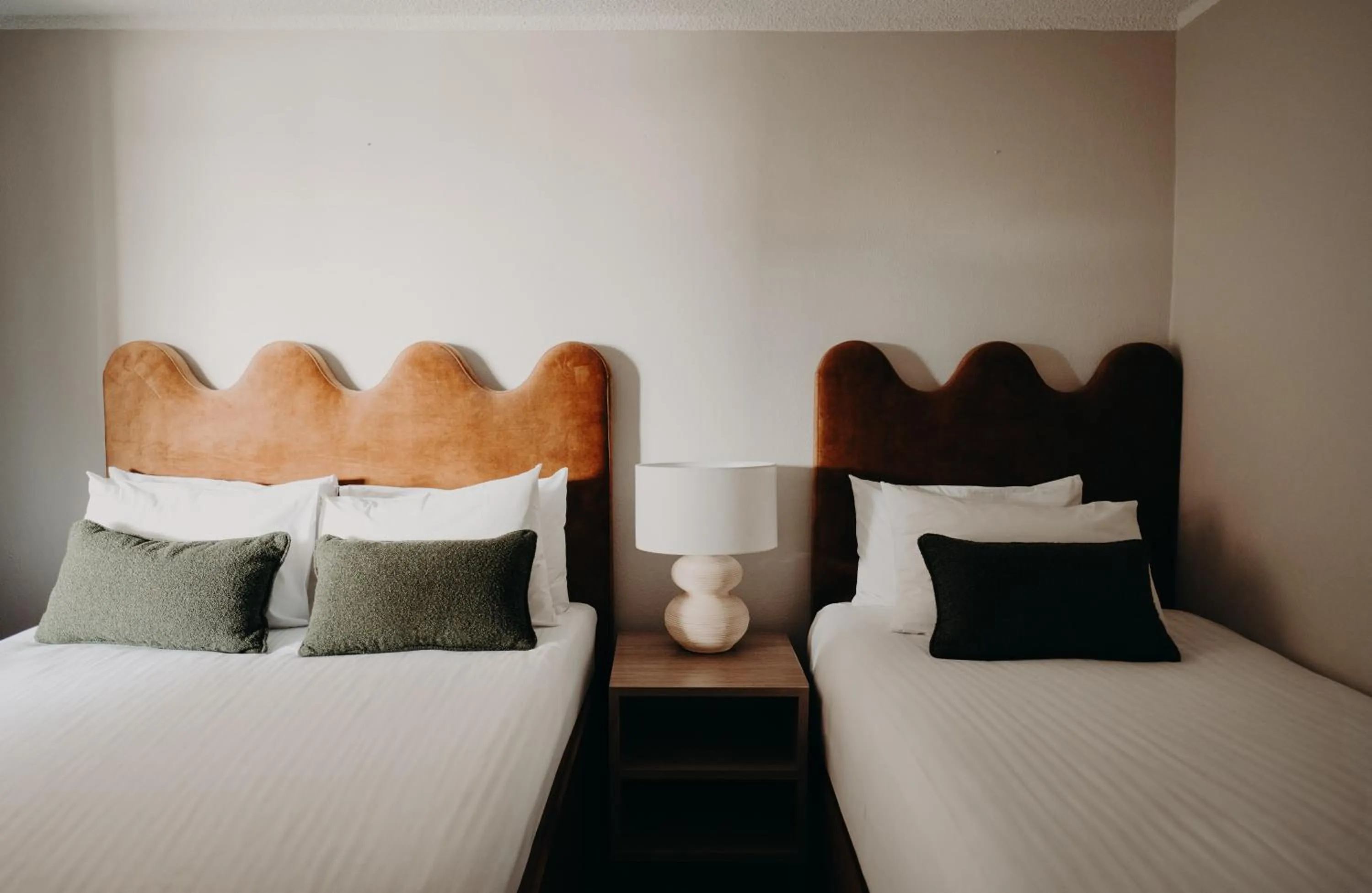 Bed in Albany Motel & Apartments