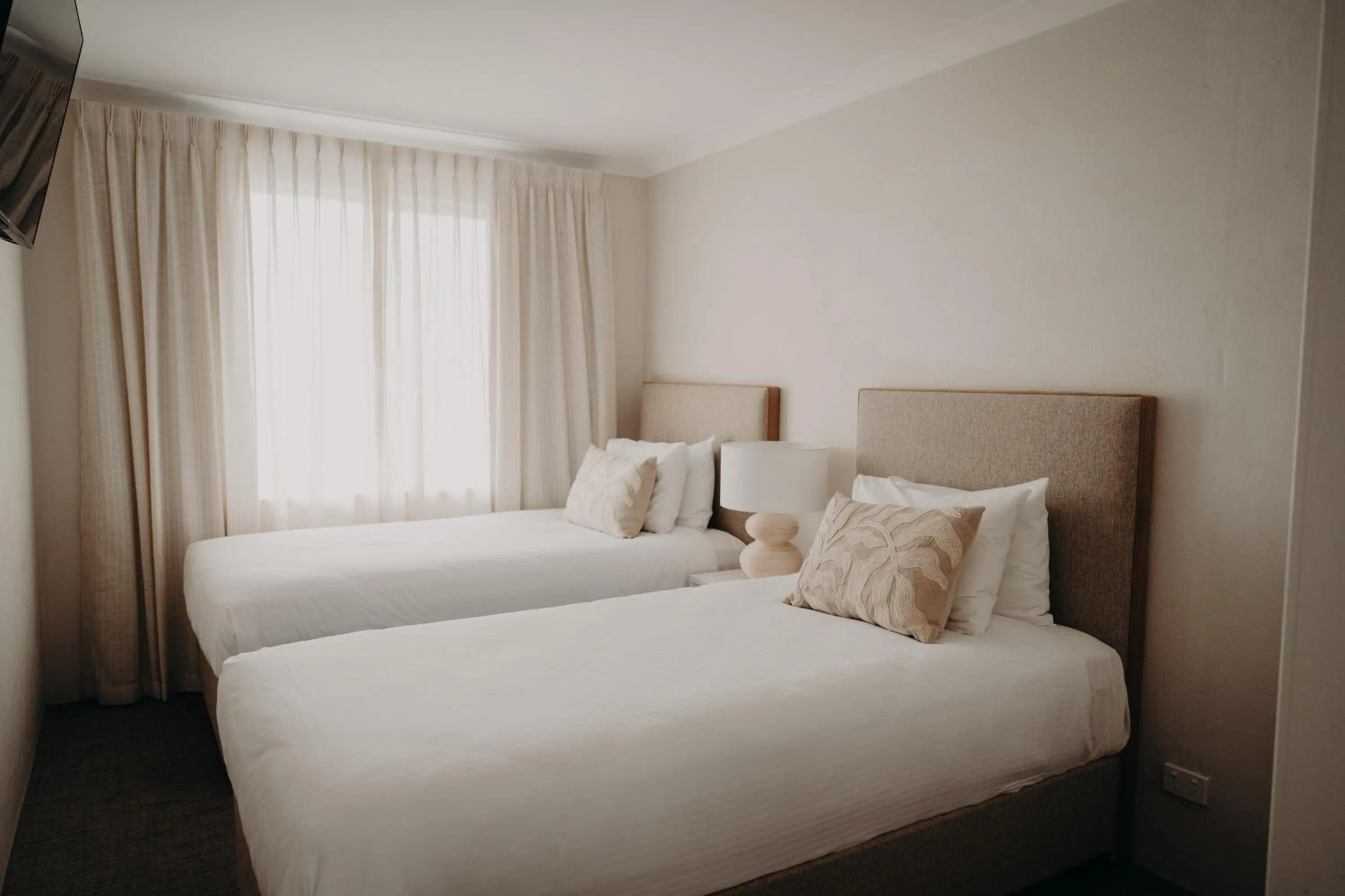 Bed in Albany Motel & Apartments