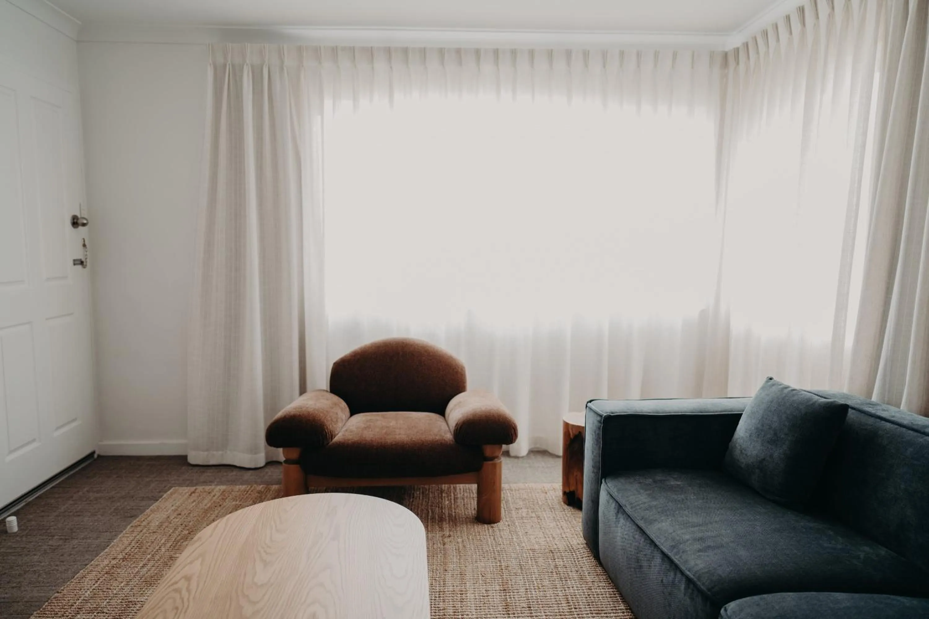 Living room in Albany Motel & Apartments
