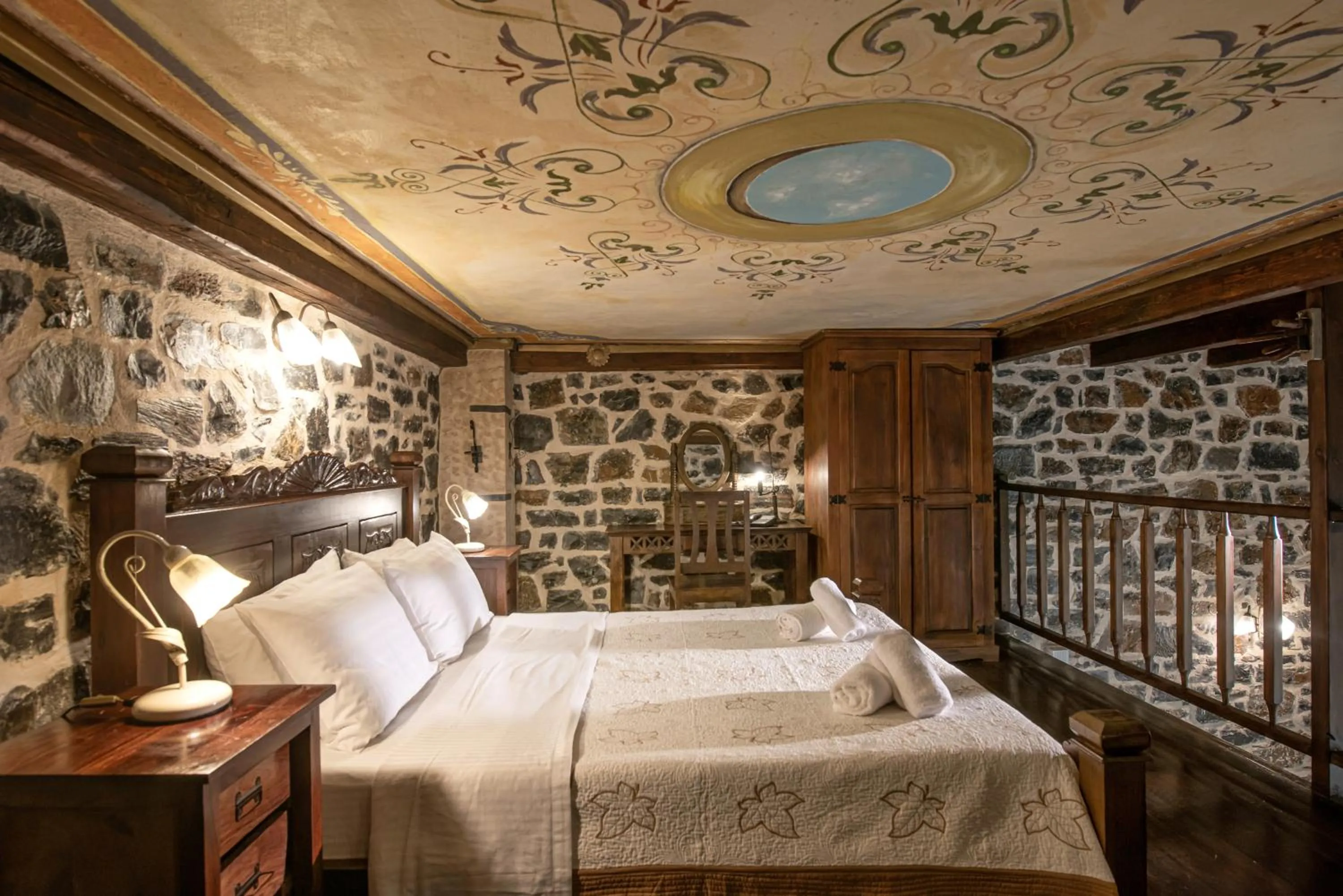 Bed in Balsamico Traditional Suites