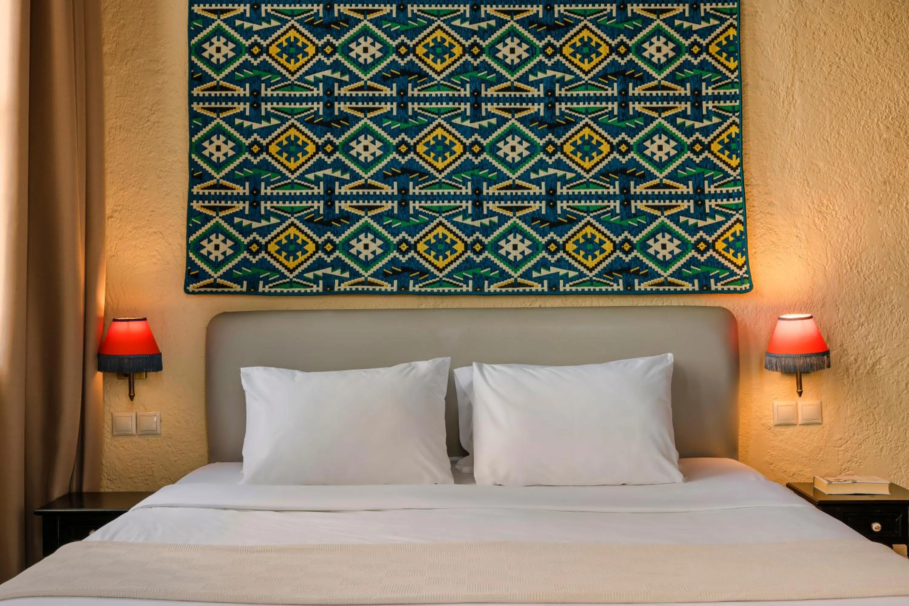 Bed in Alcanea Boutique Hotel