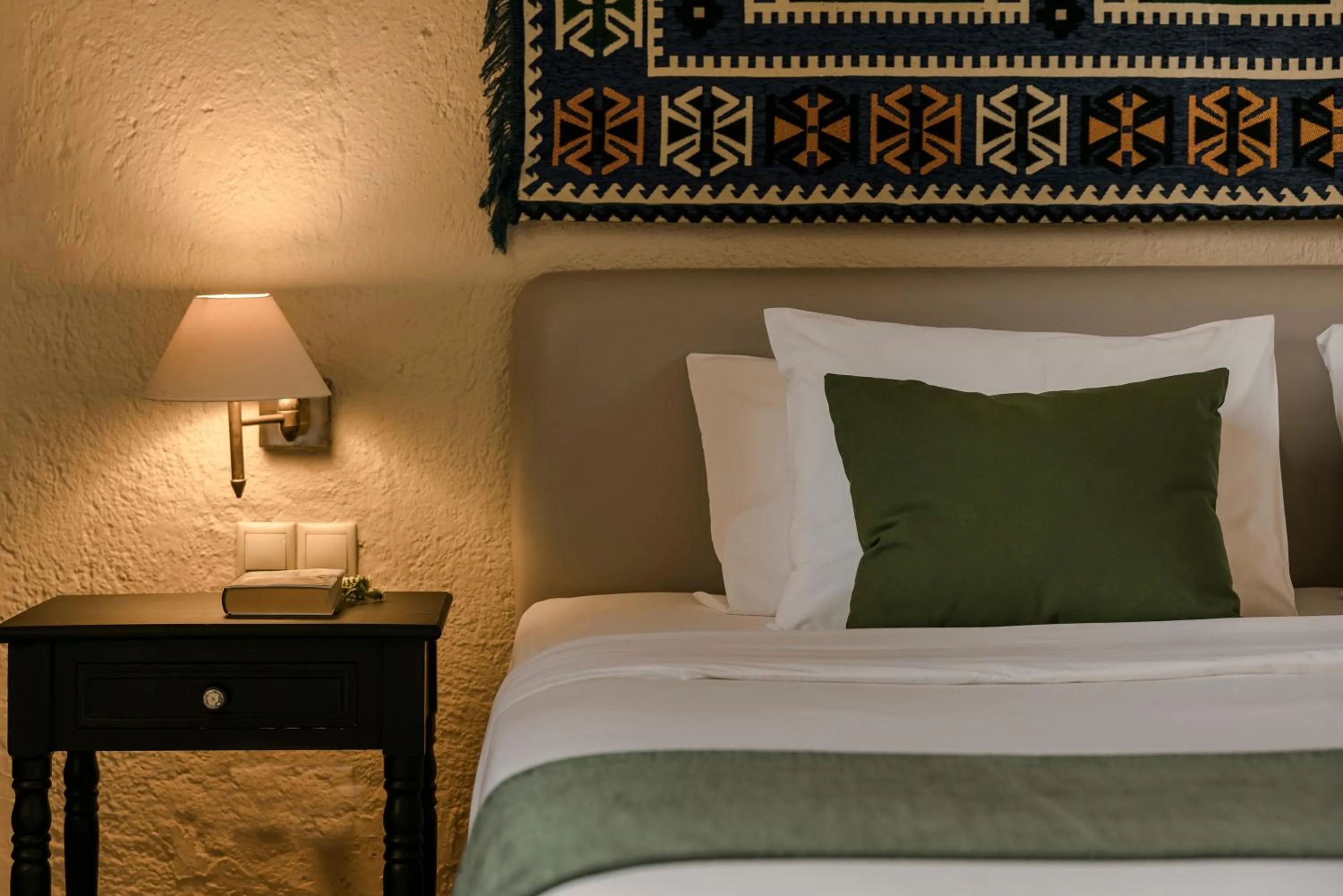 Bed in Alcanea Boutique Hotel