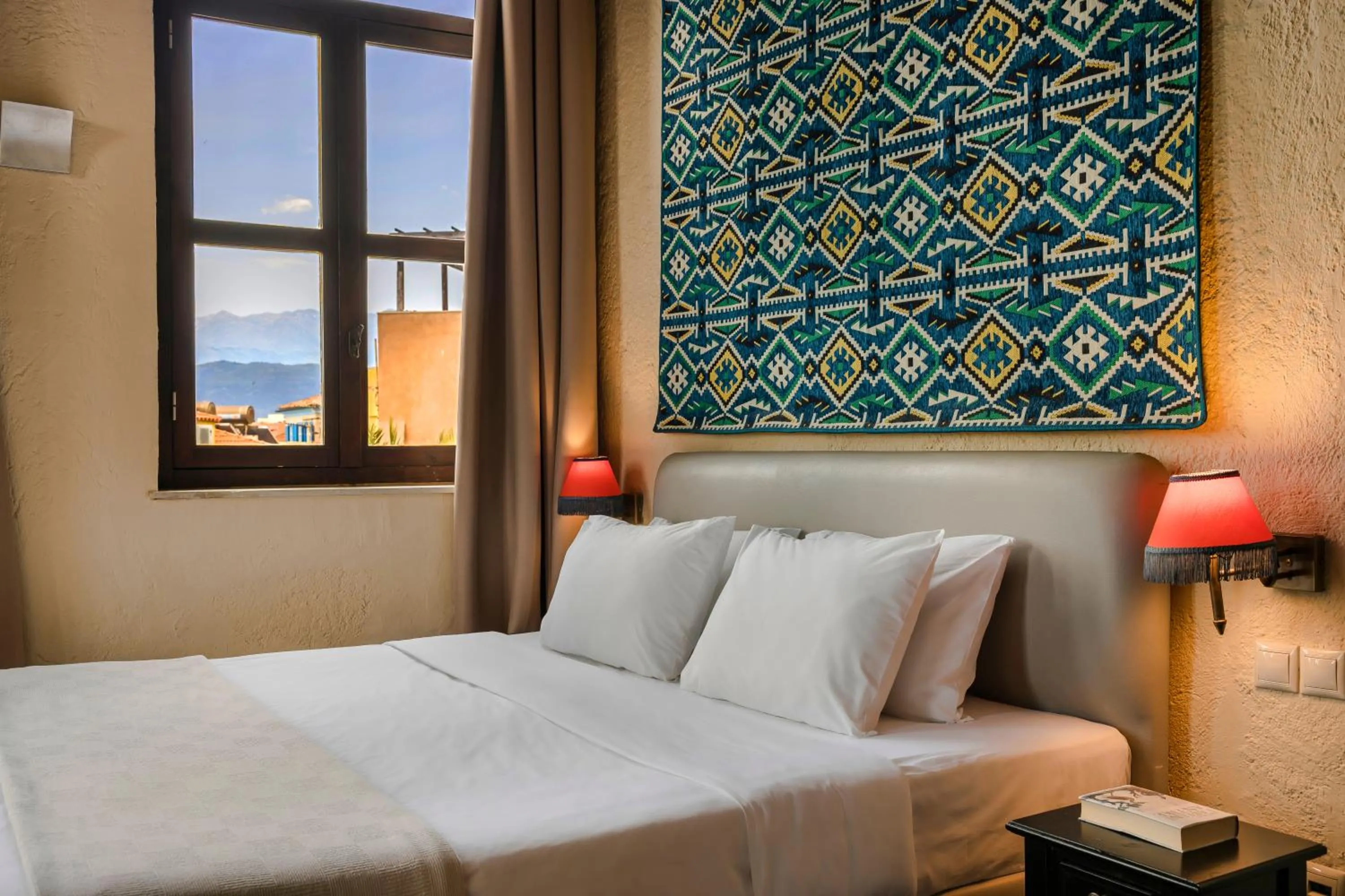 Bed in Alcanea Boutique Hotel