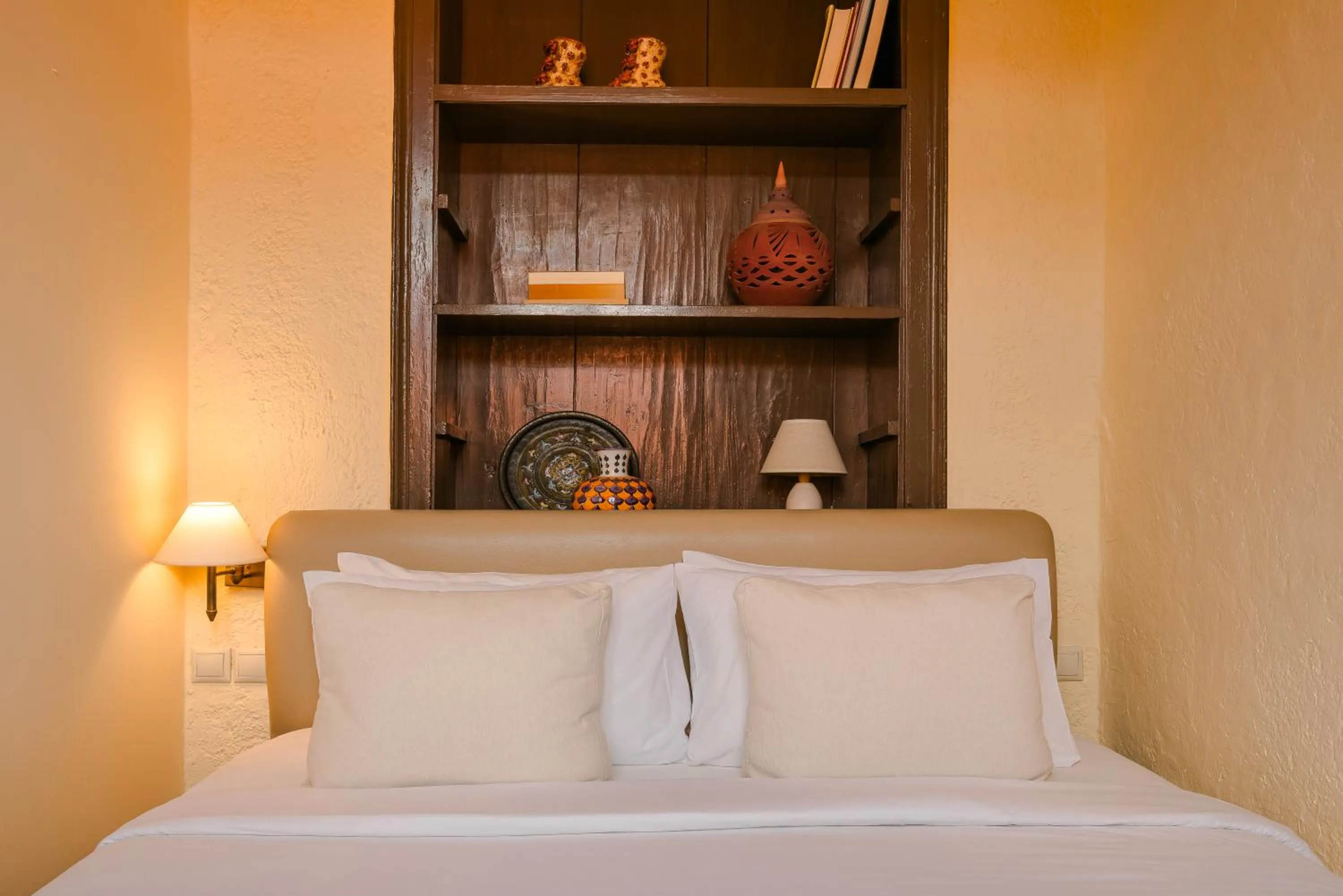 Bed in Alcanea Boutique Hotel