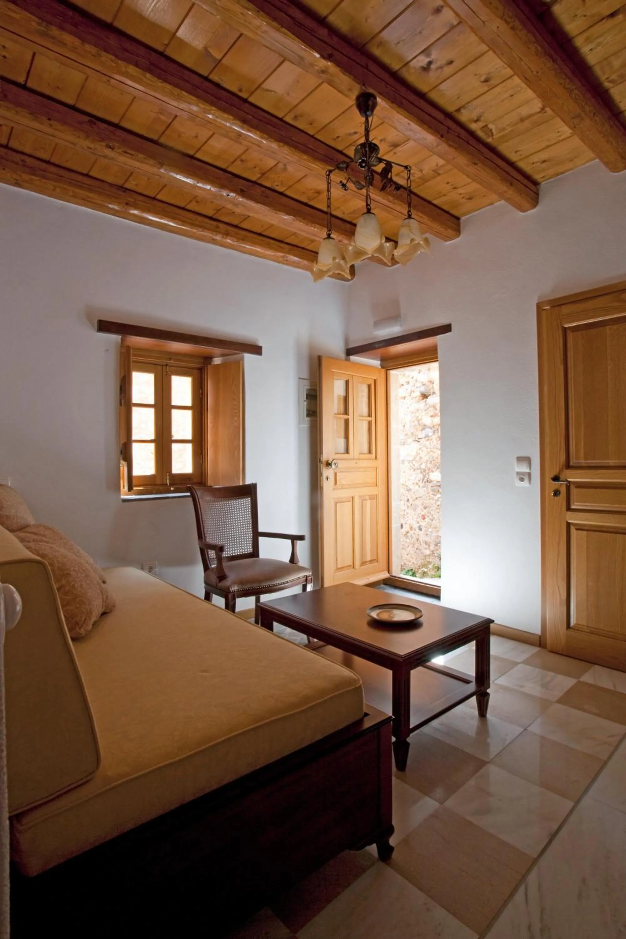 Seating area, Bed in Likinia Hotel