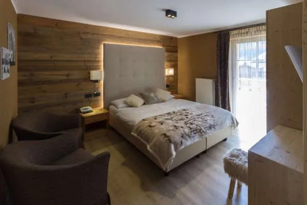 Bed in Arnica Mountain Hotel