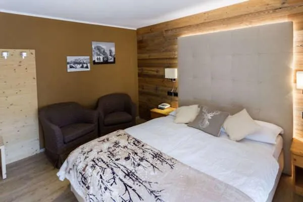 Bed in Arnica Mountain Hotel