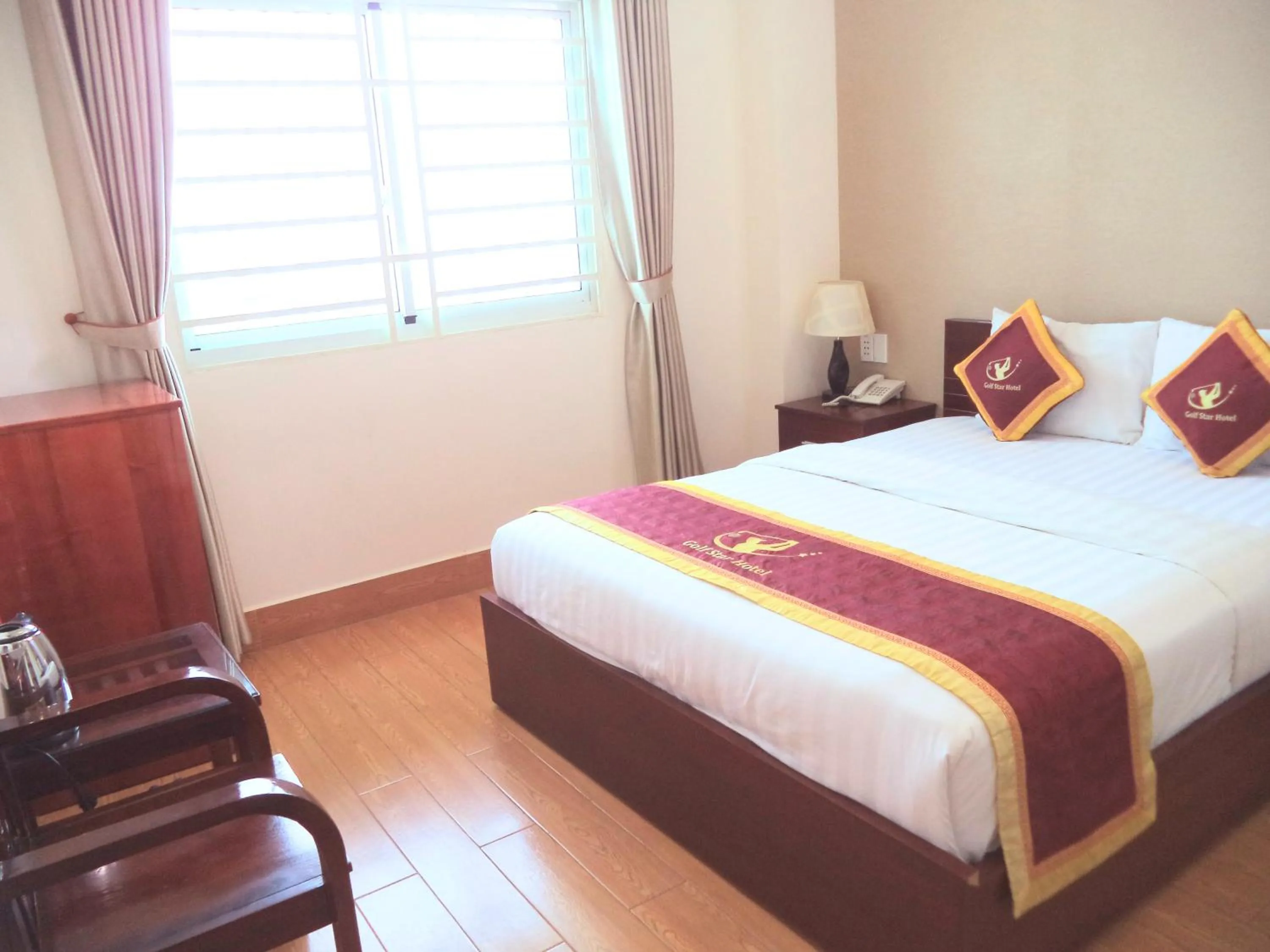 Bed in Golf Star Hotel