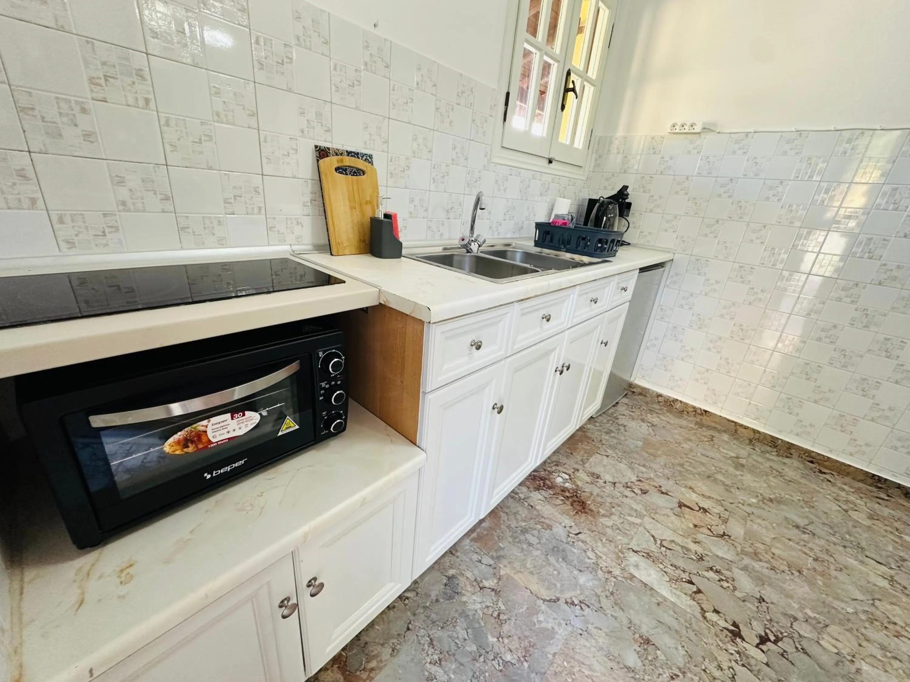 Kitchen or kitchenette in Nikos Apartments Corfu