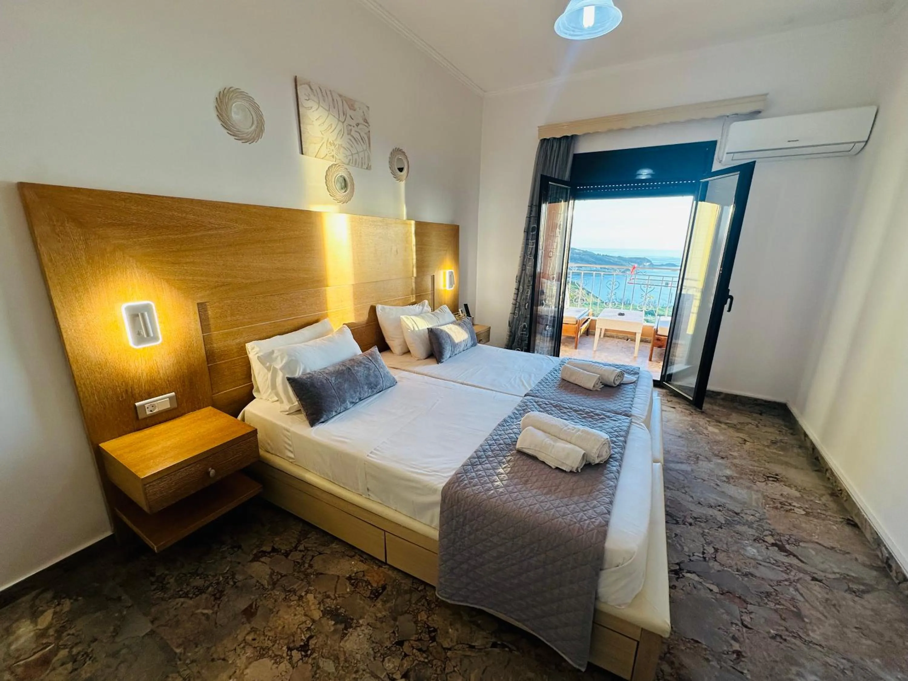 Bed in Nikos Apartments Corfu