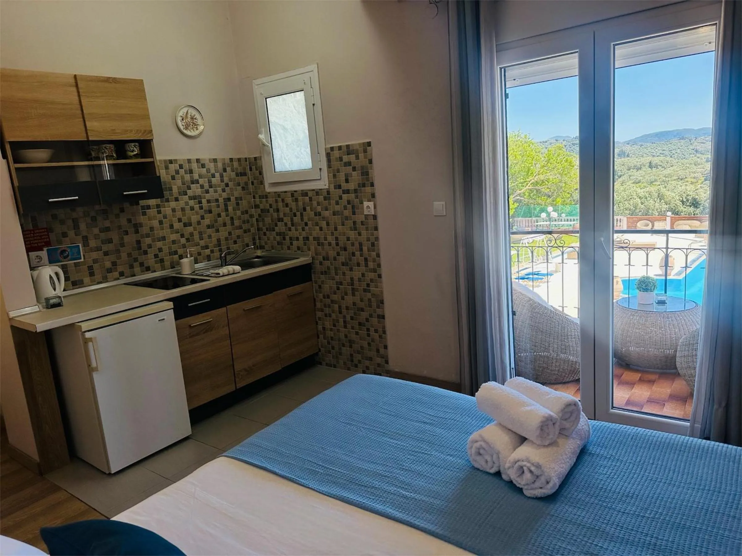 Bed in Nikos Apartments Corfu