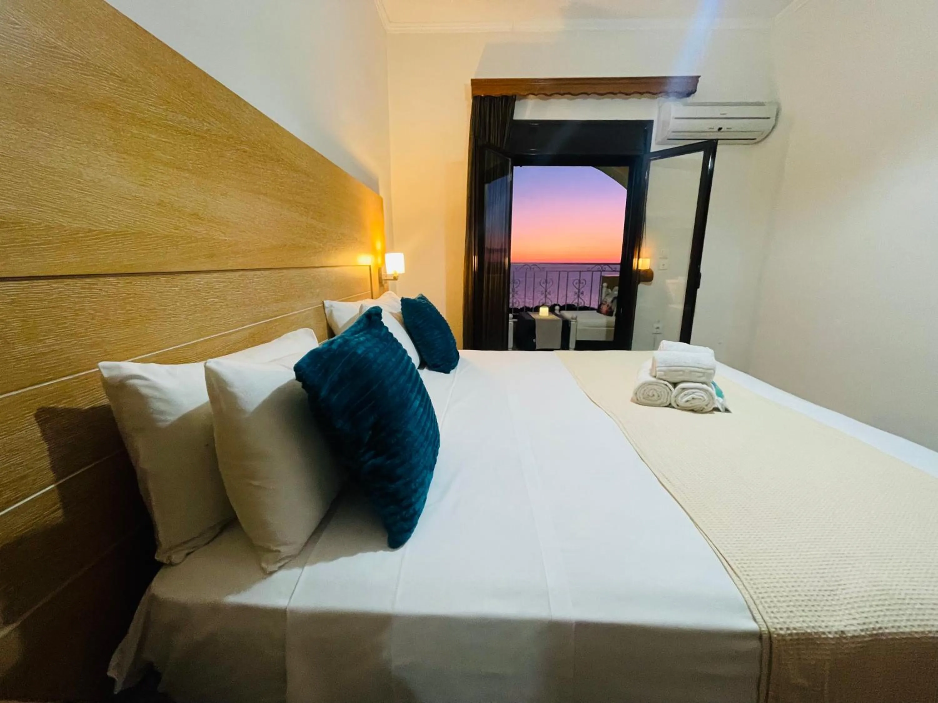 Bed in Nikos Apartments Corfu