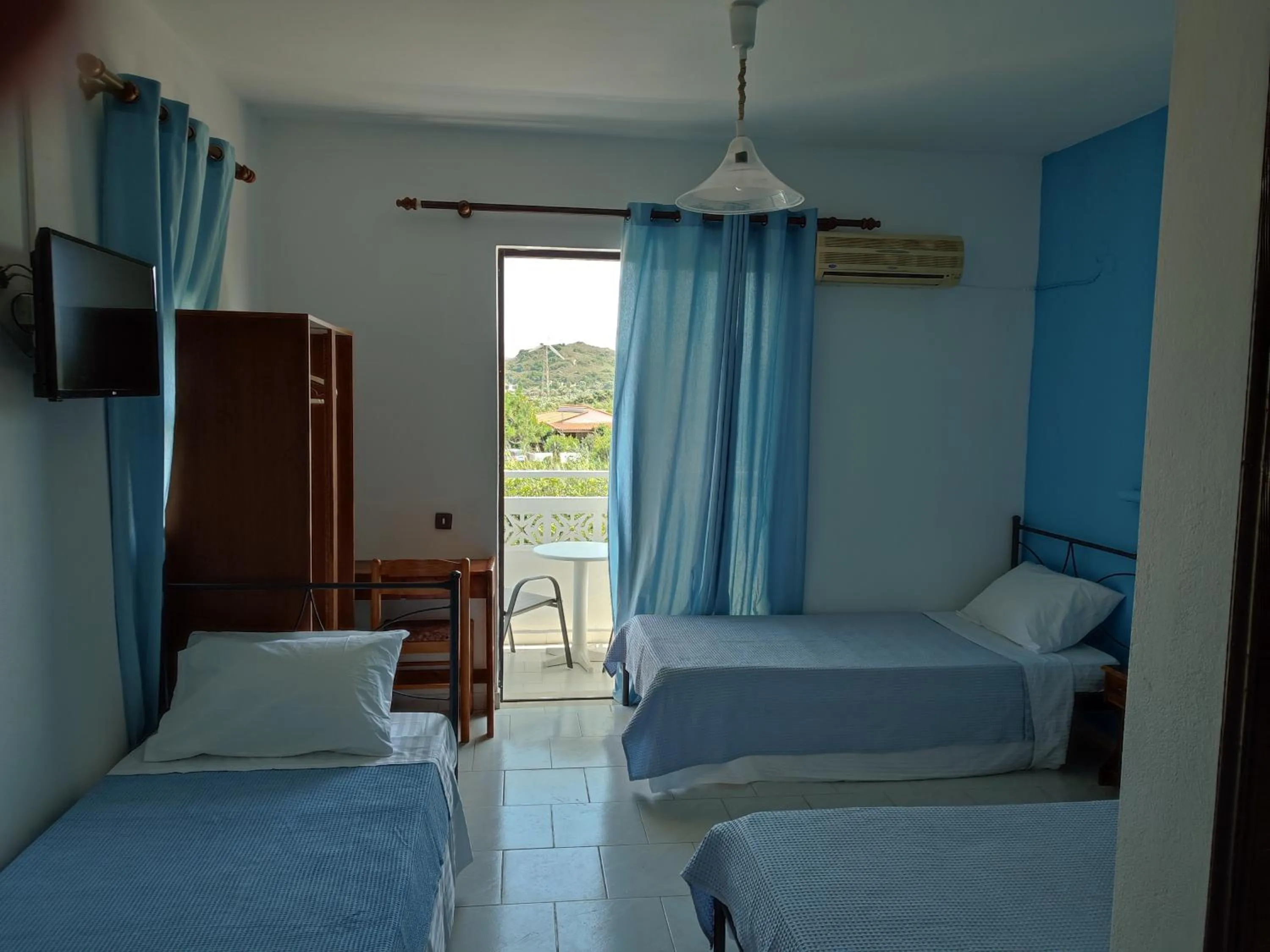 Bed in Dolphin Apartments