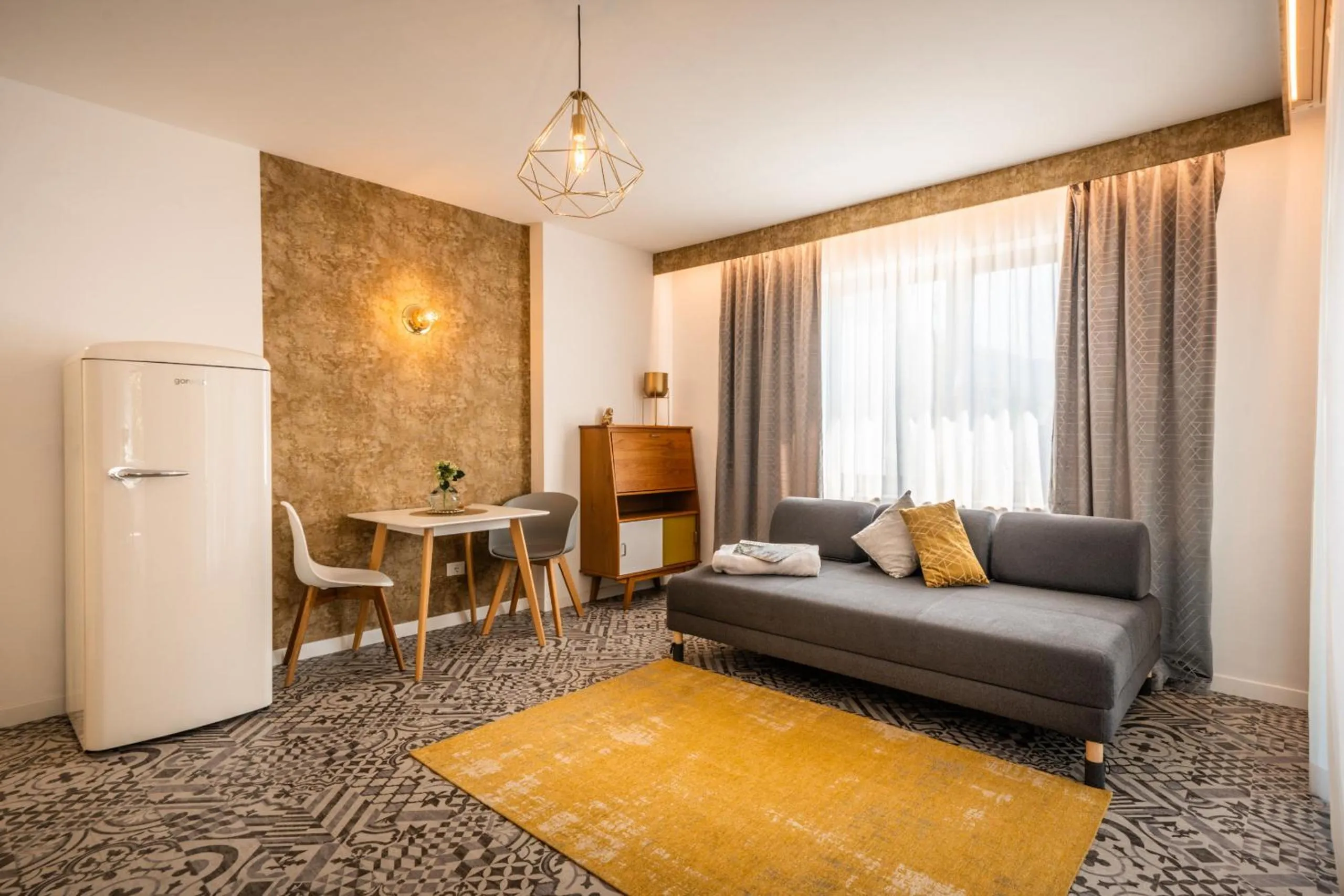 Living room in goldfinger + suites