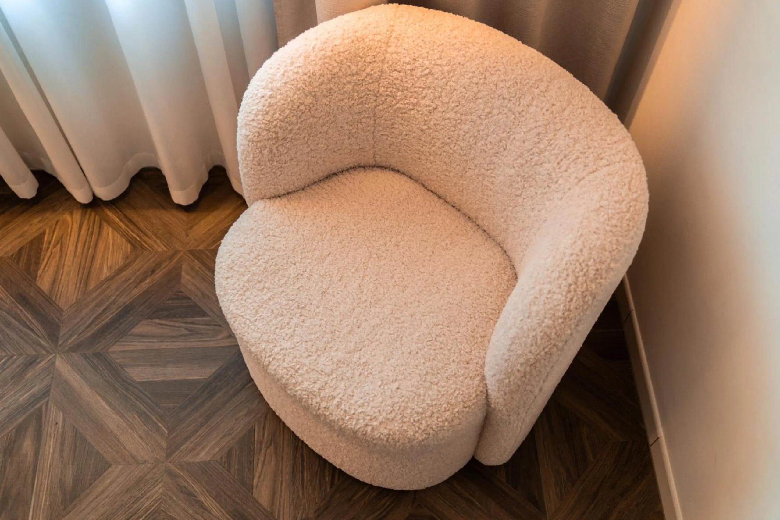 Seating area in goldfinger + suites