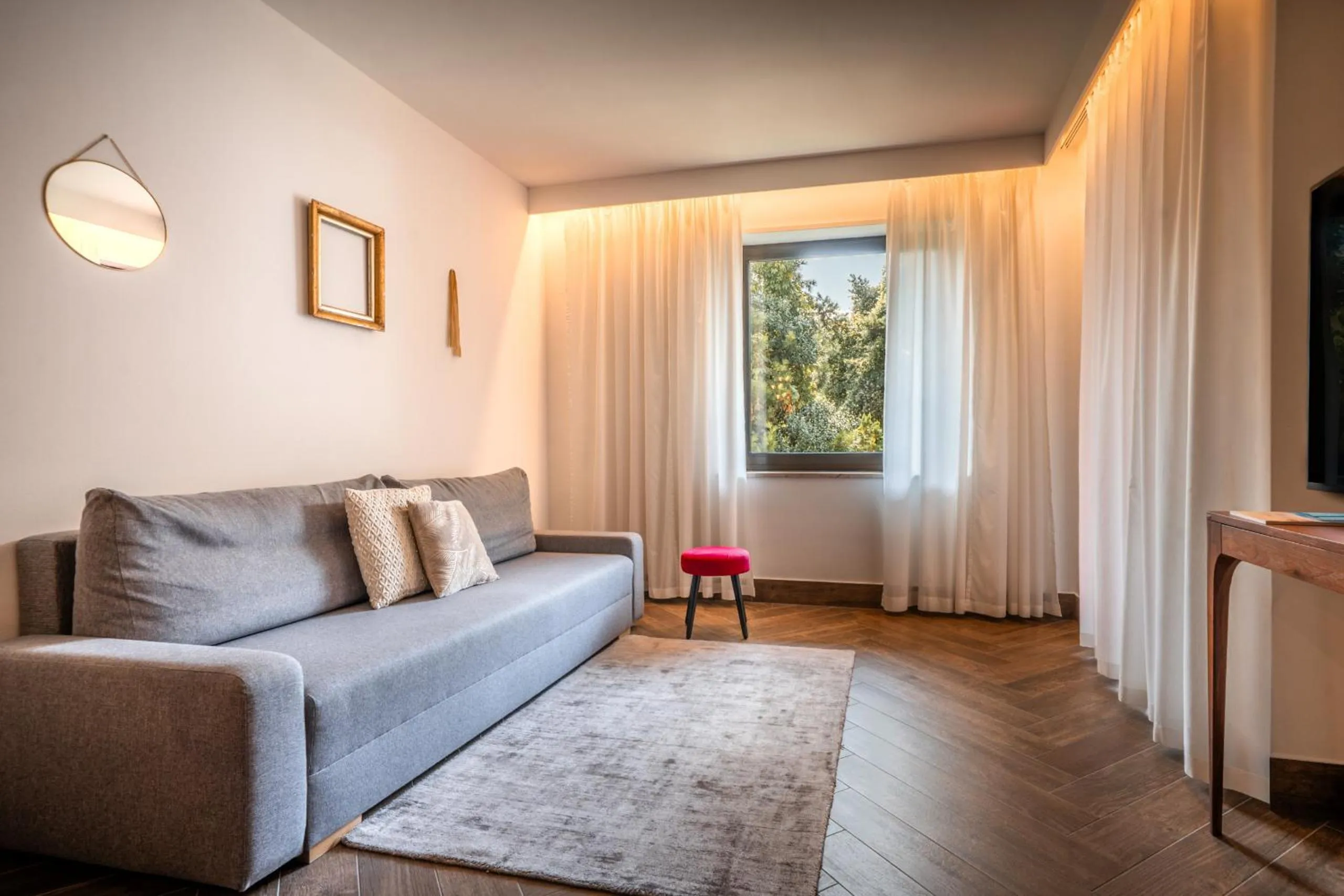 Living room in goldfinger + suites