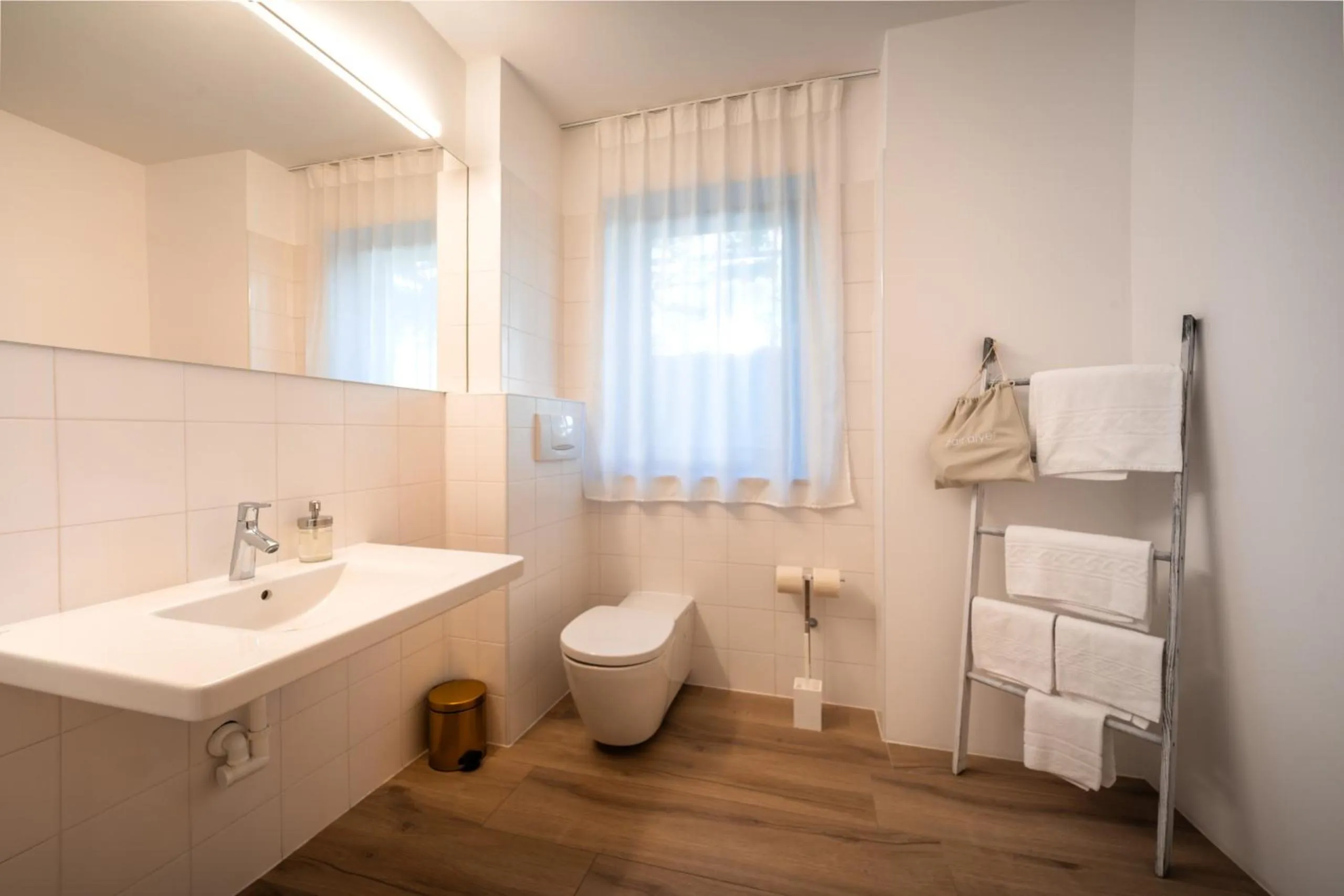 Bathroom in goldfinger + suites