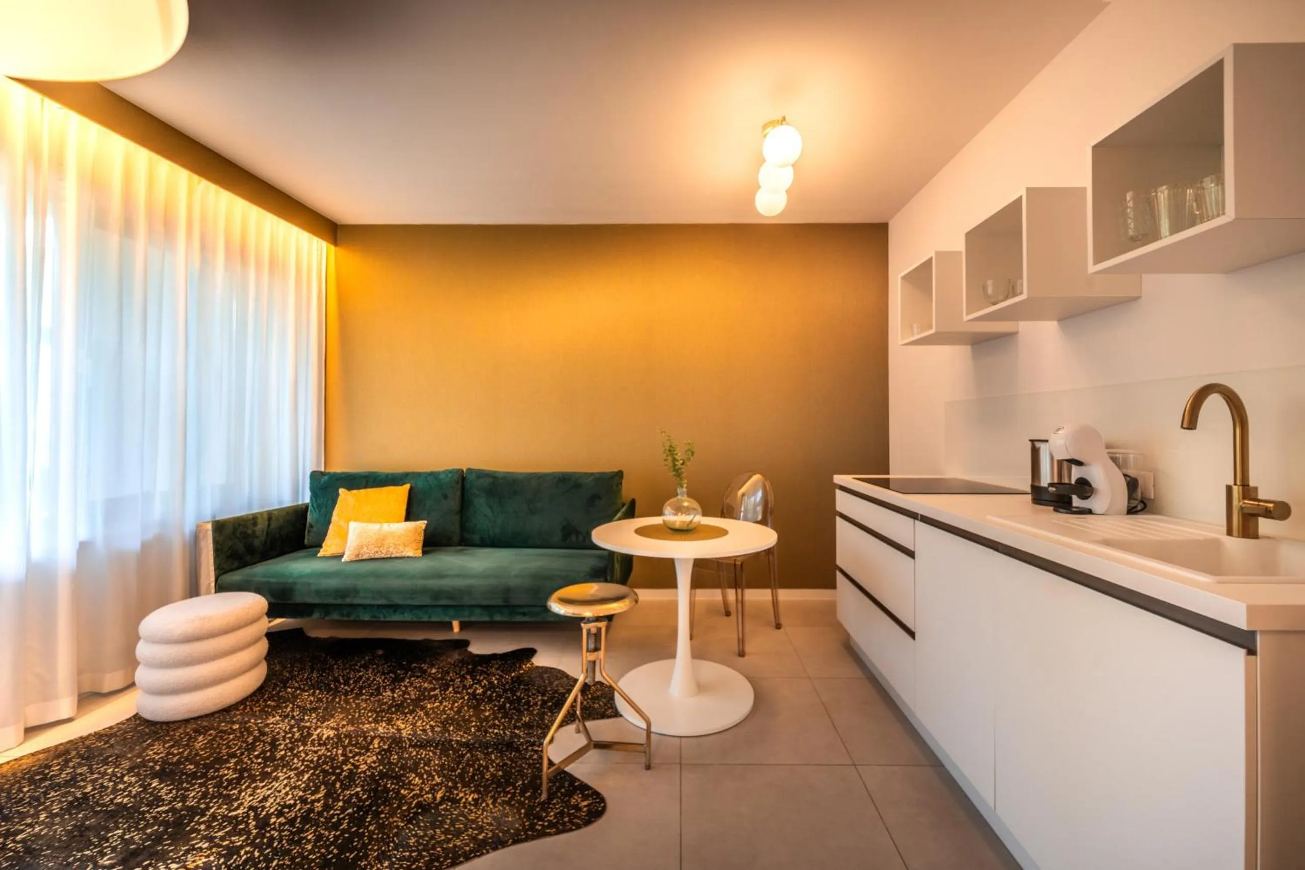 Kitchen or kitchenette in goldfinger + suites