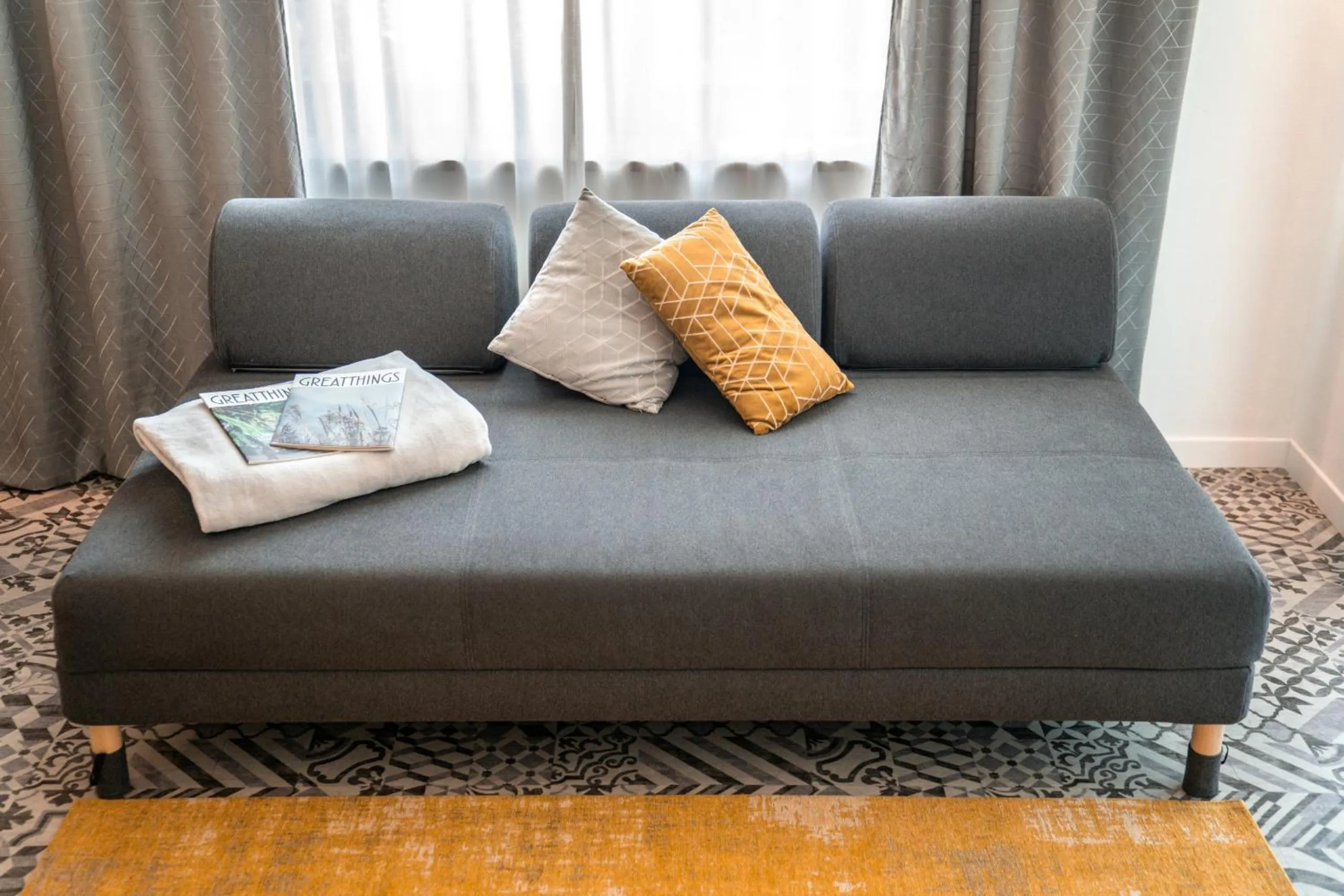 Living room in goldfinger + suites