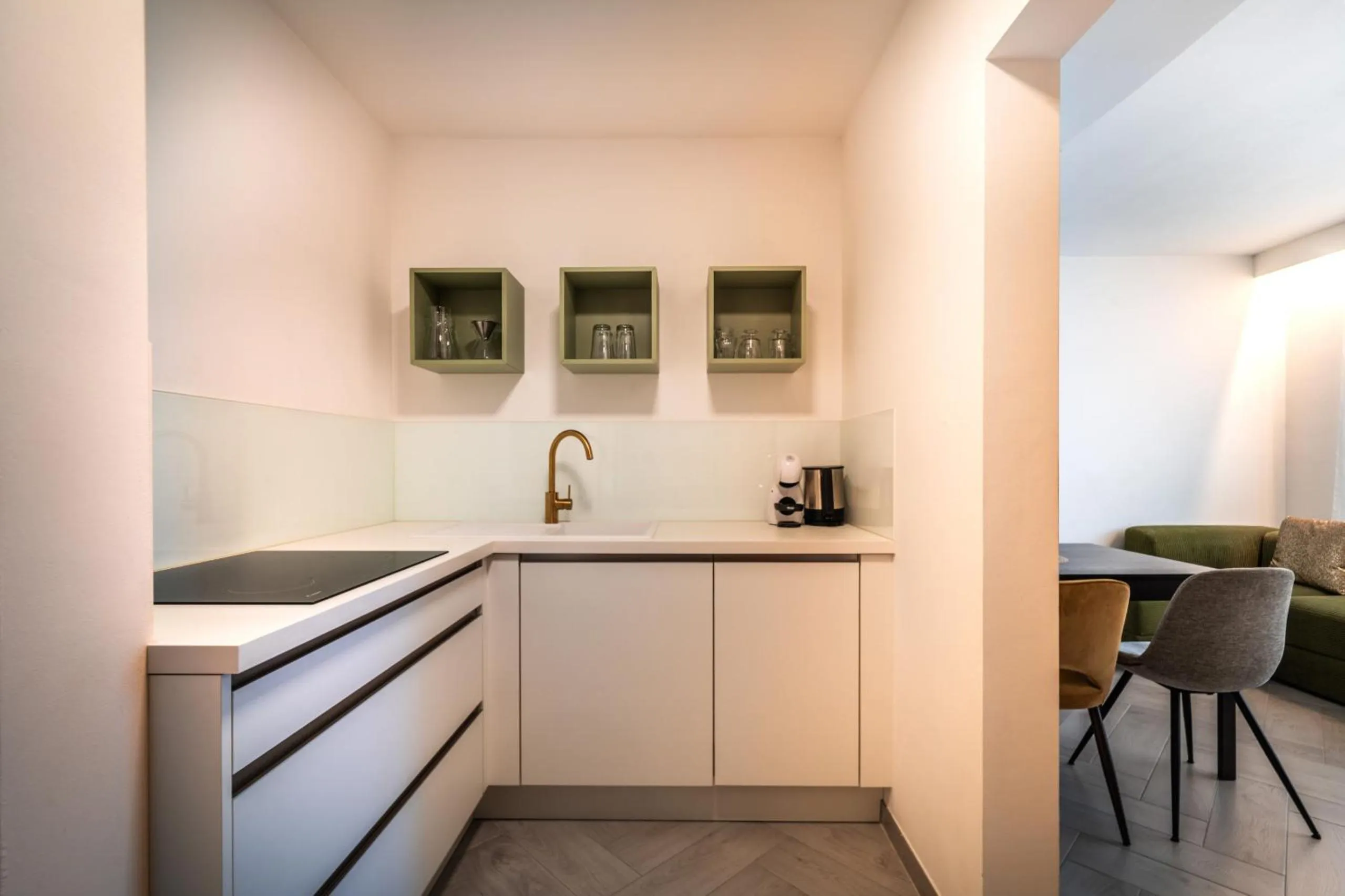 Kitchen or kitchenette in goldfinger + suites