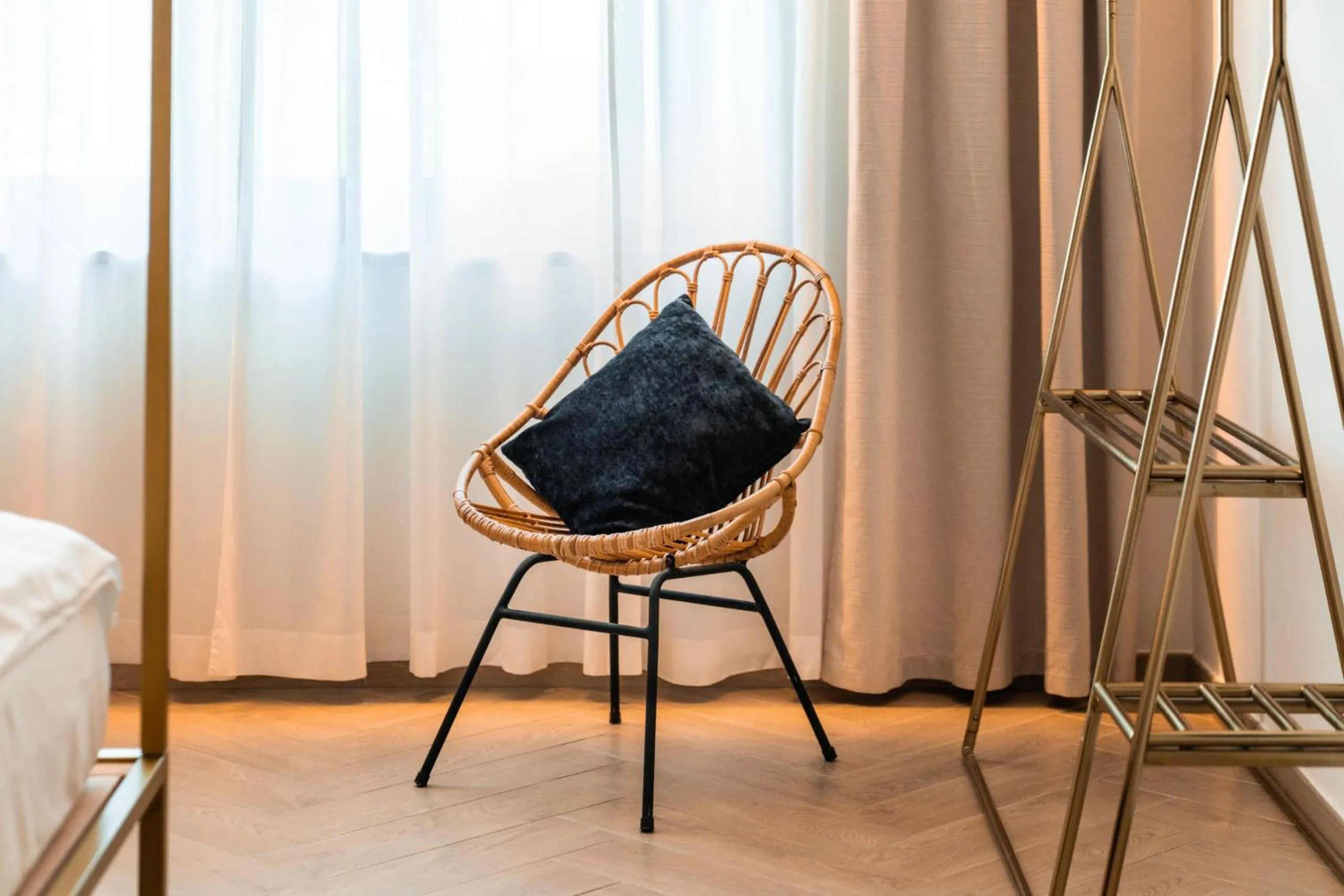 Bedroom in goldfinger + suites