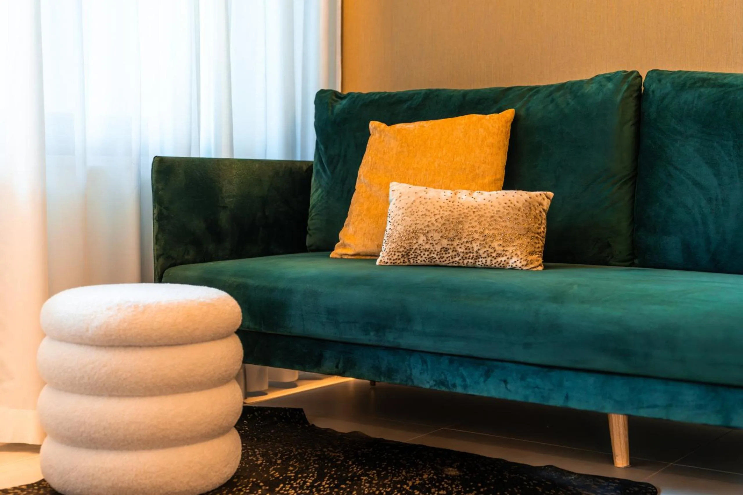 Living room in goldfinger + suites