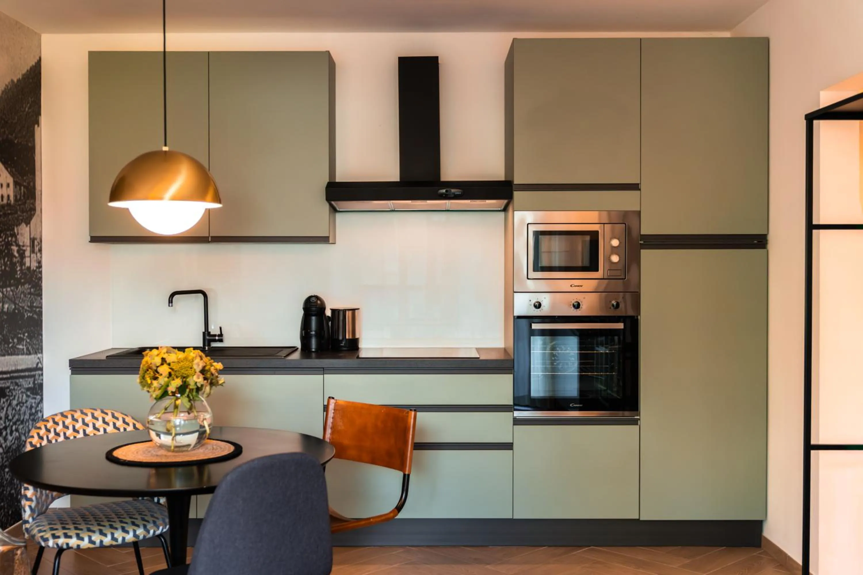 Kitchen or kitchenette in goldfinger + suites