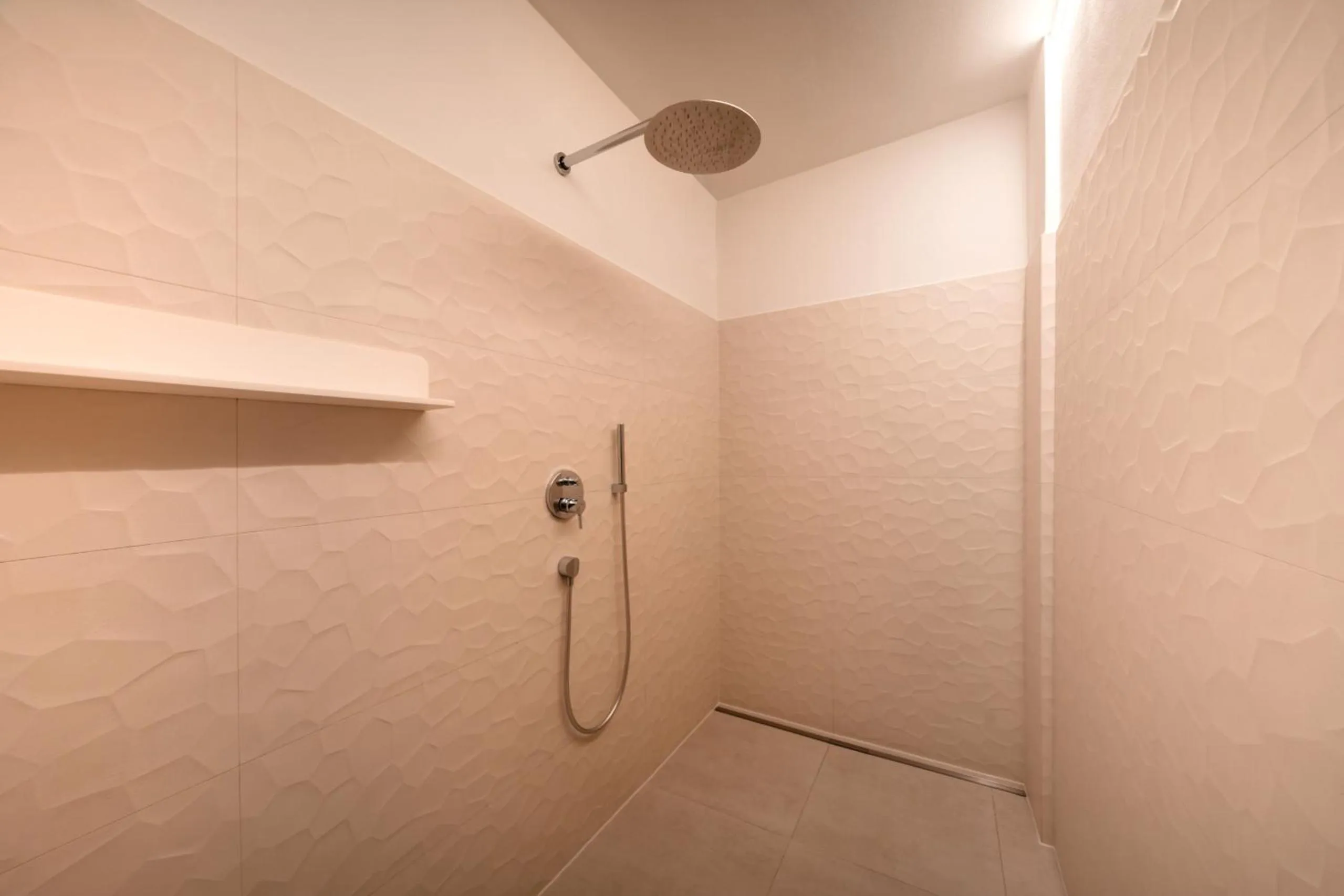 Shower in goldfinger + suites