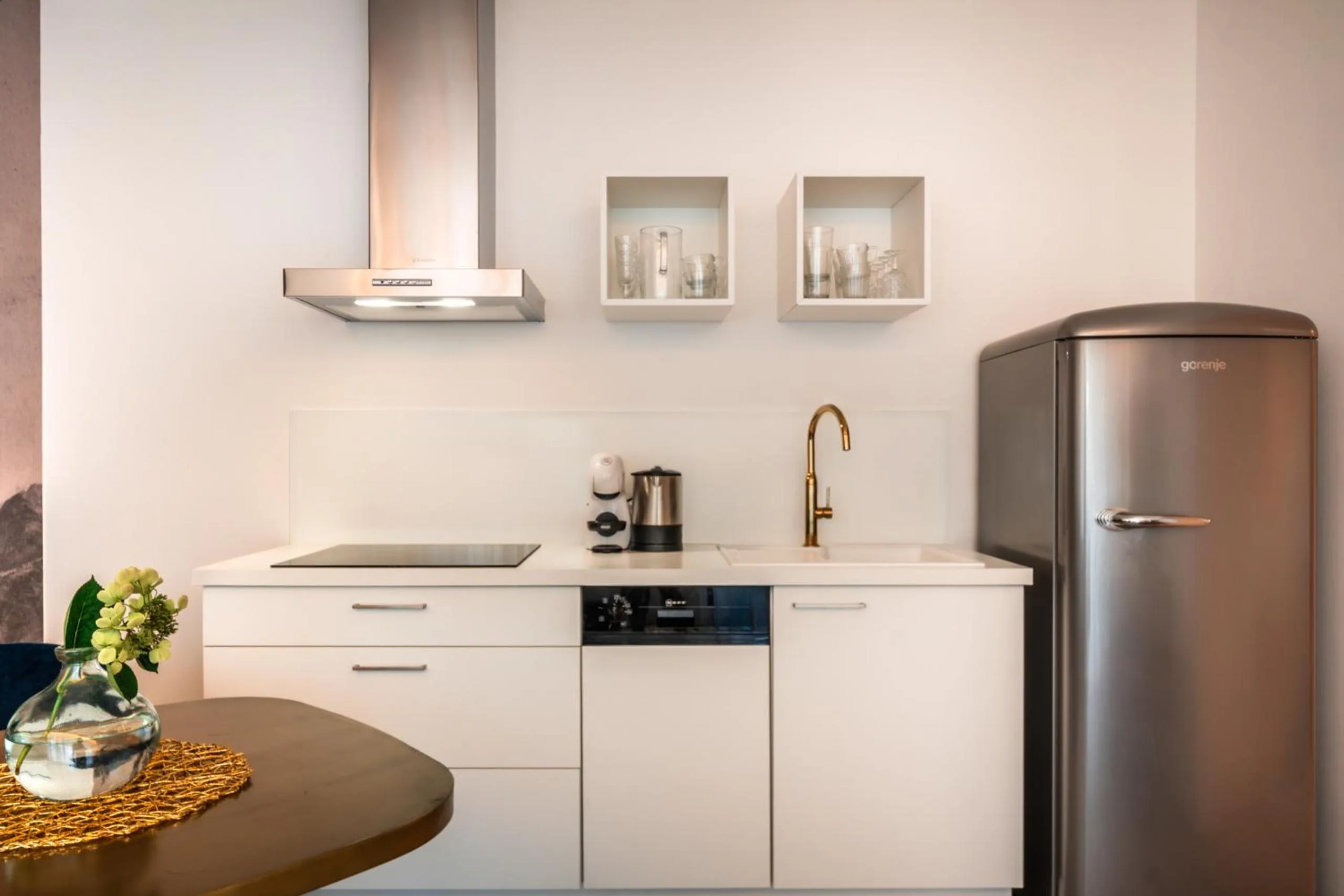 Kitchen or kitchenette in goldfinger + suites