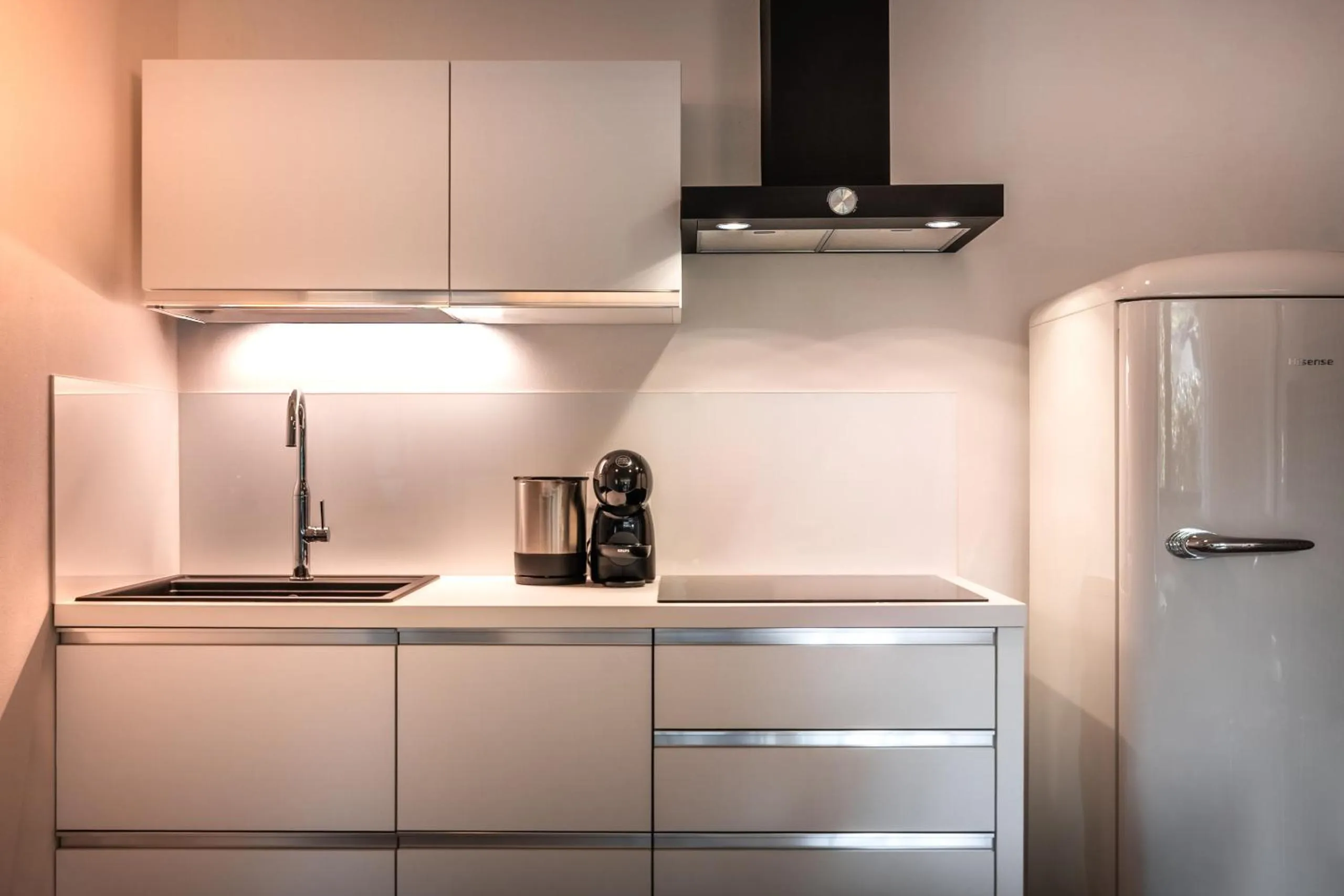 Kitchen or kitchenette in goldfinger + suites