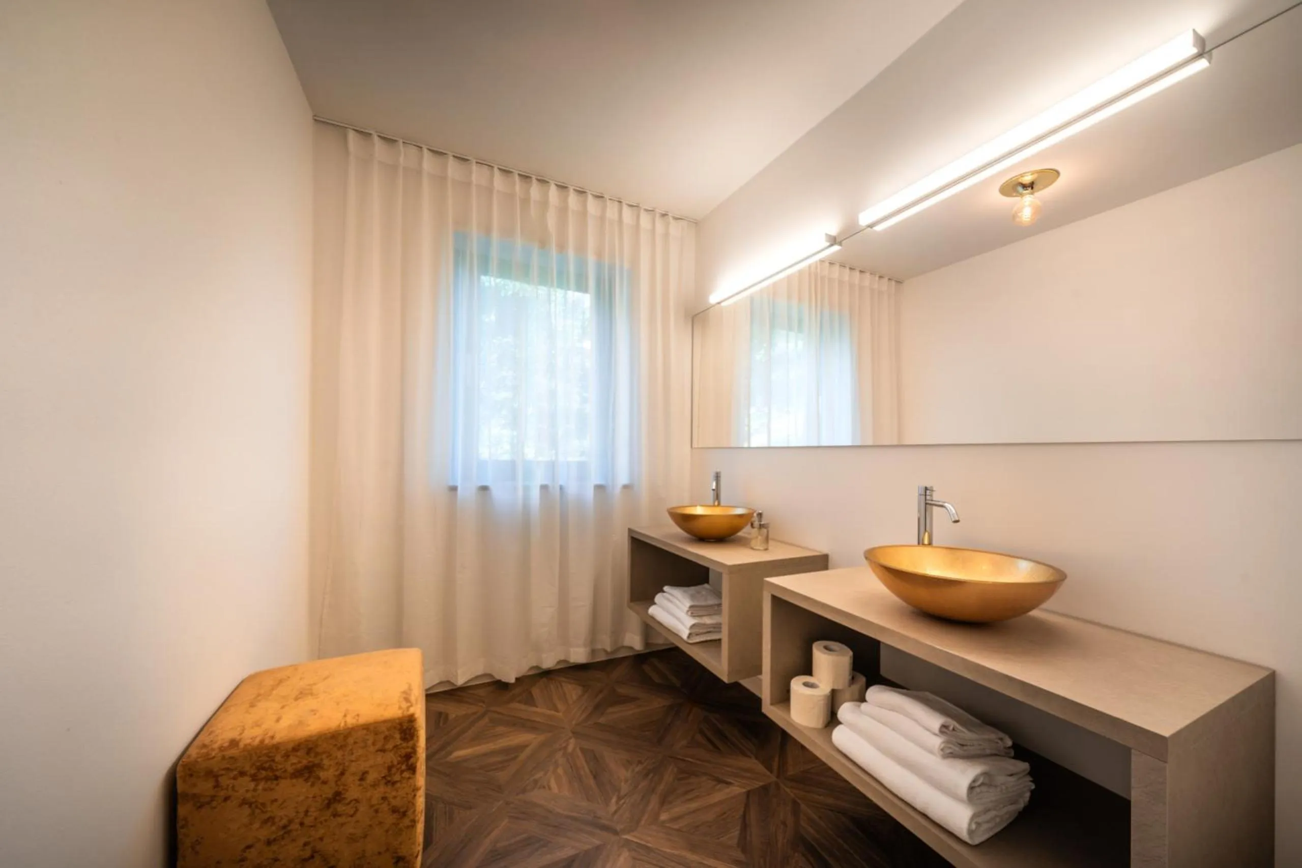 Bathroom in goldfinger + suites