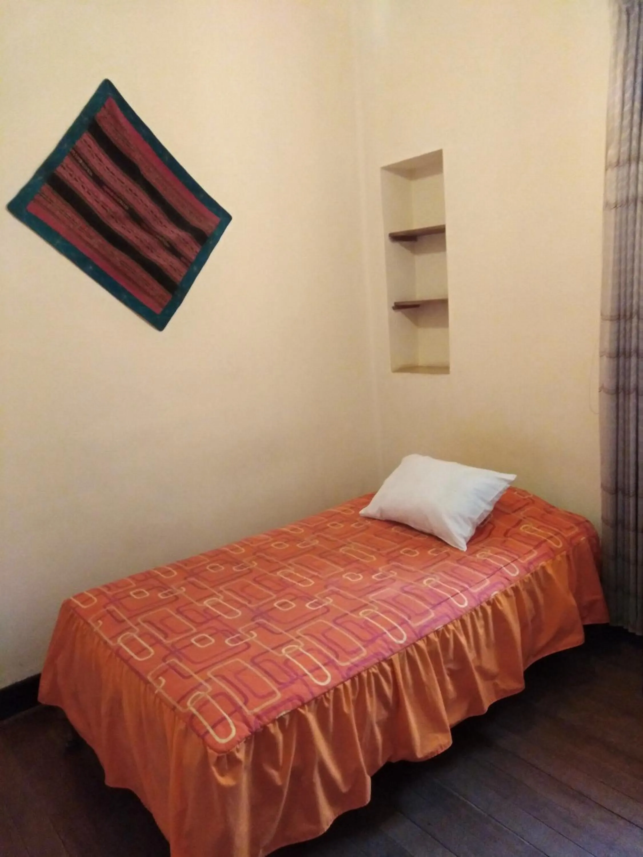 Bed in El Tuco Hotel