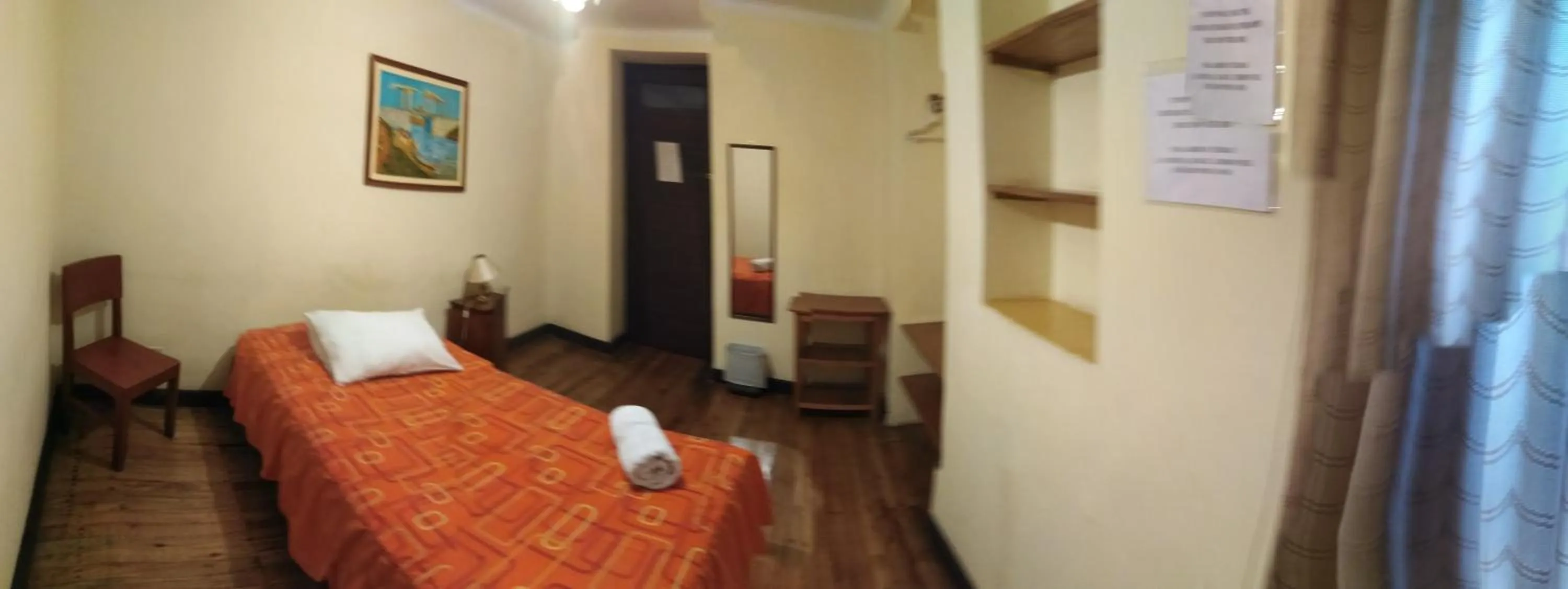 Bed in El Tuco Hotel