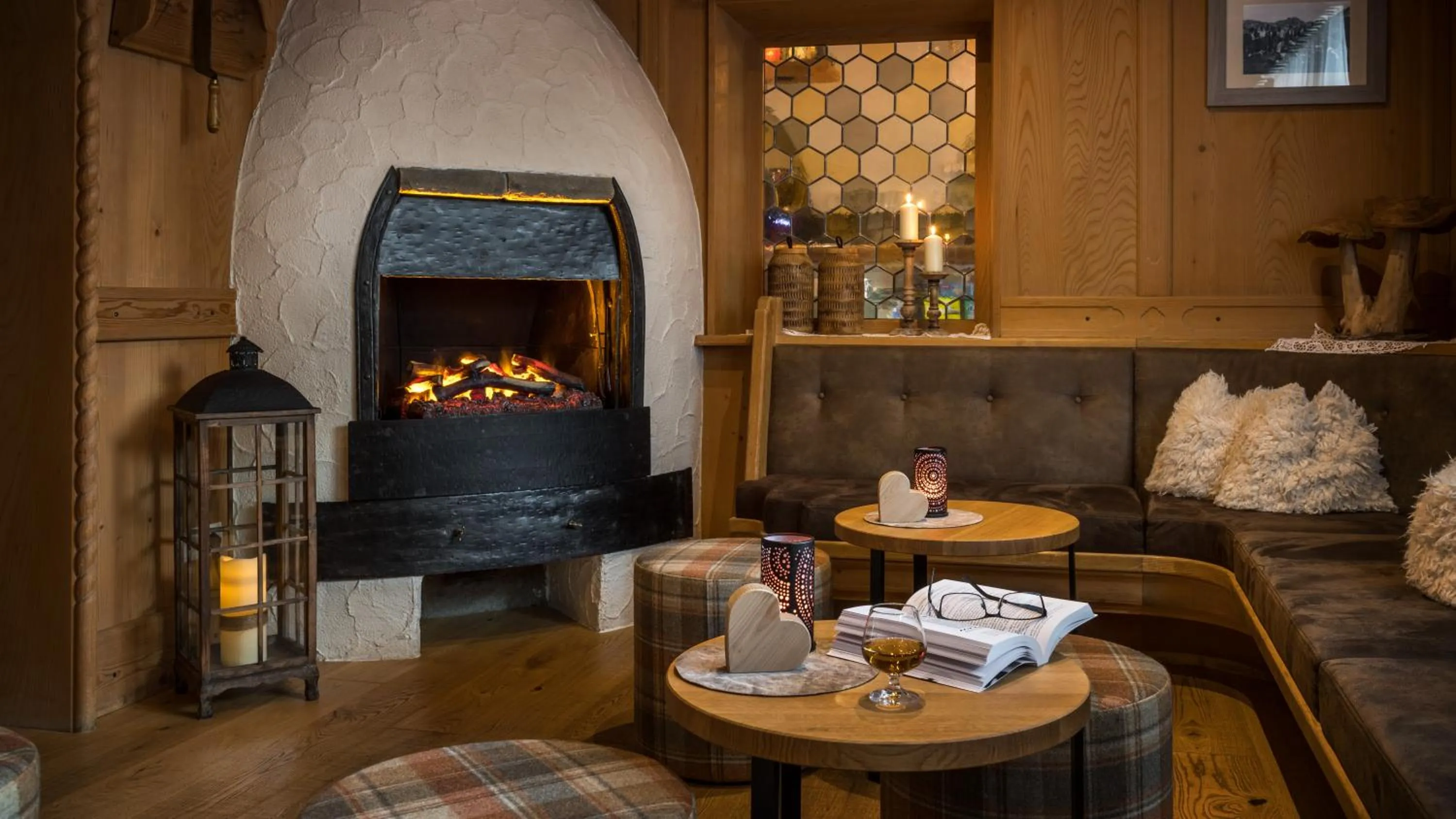 Communal lounge/ TV room in Geniesserhotel Messnerwirt Olang