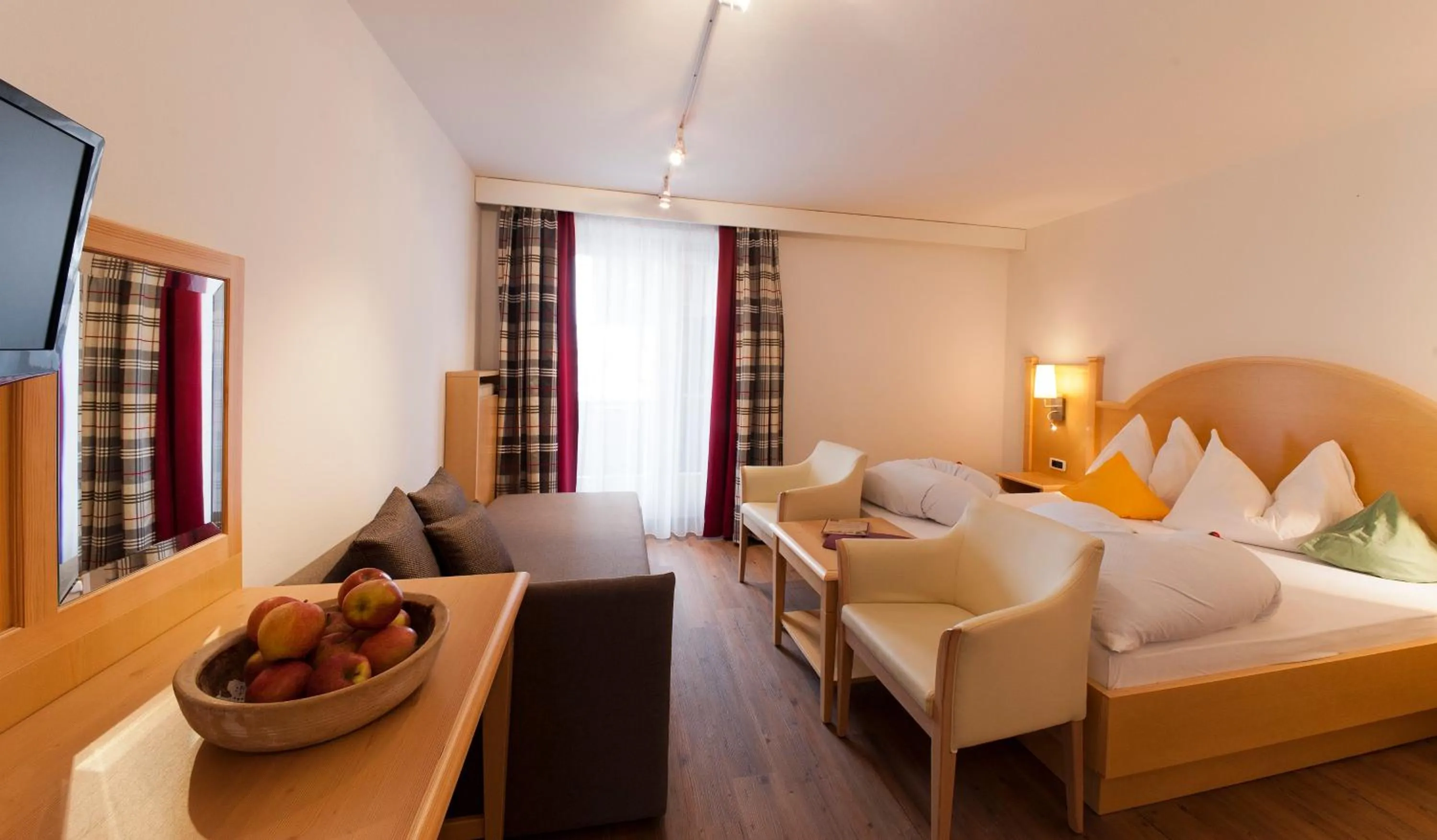 Photo of the whole room, Bed in Geniesserhotel Messnerwirt Olang