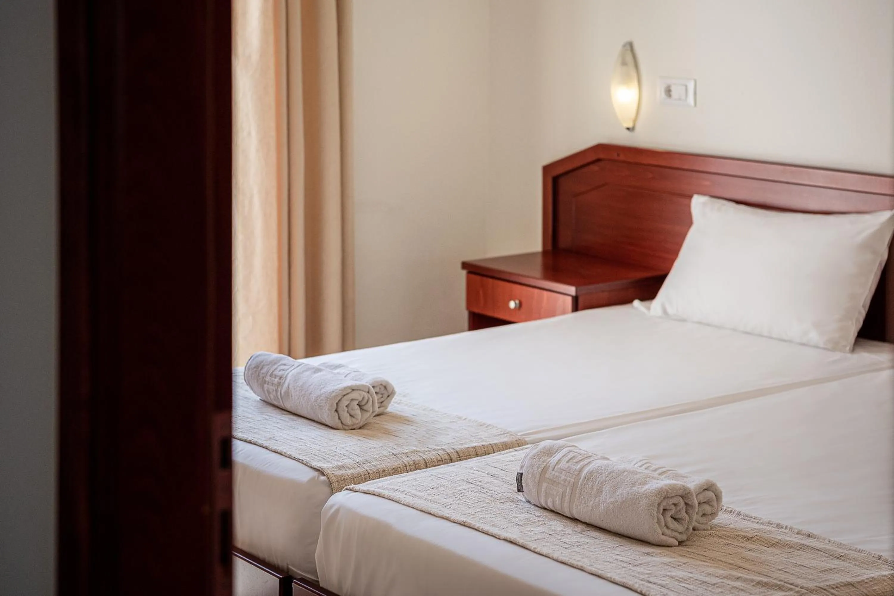 Property building, Bed in Artemis Apartments