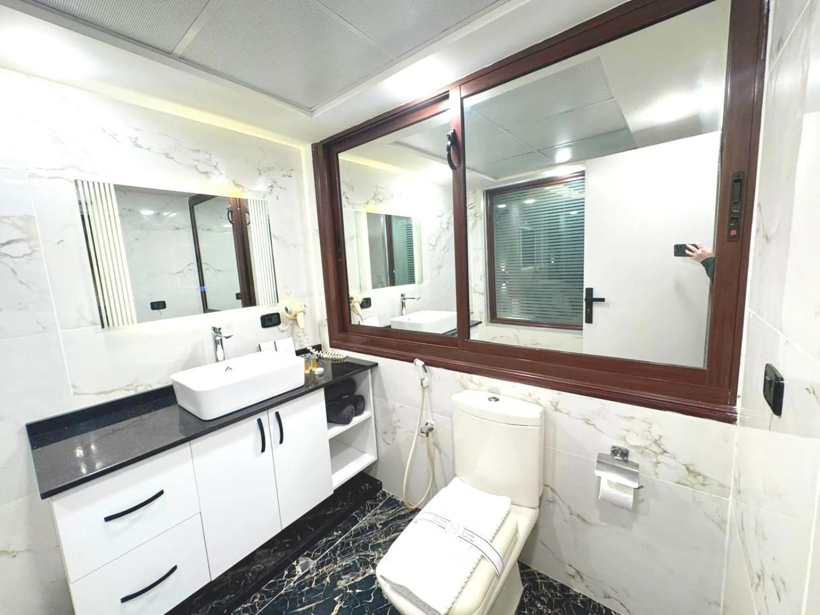 Bathroom in Queens Suite Hotel