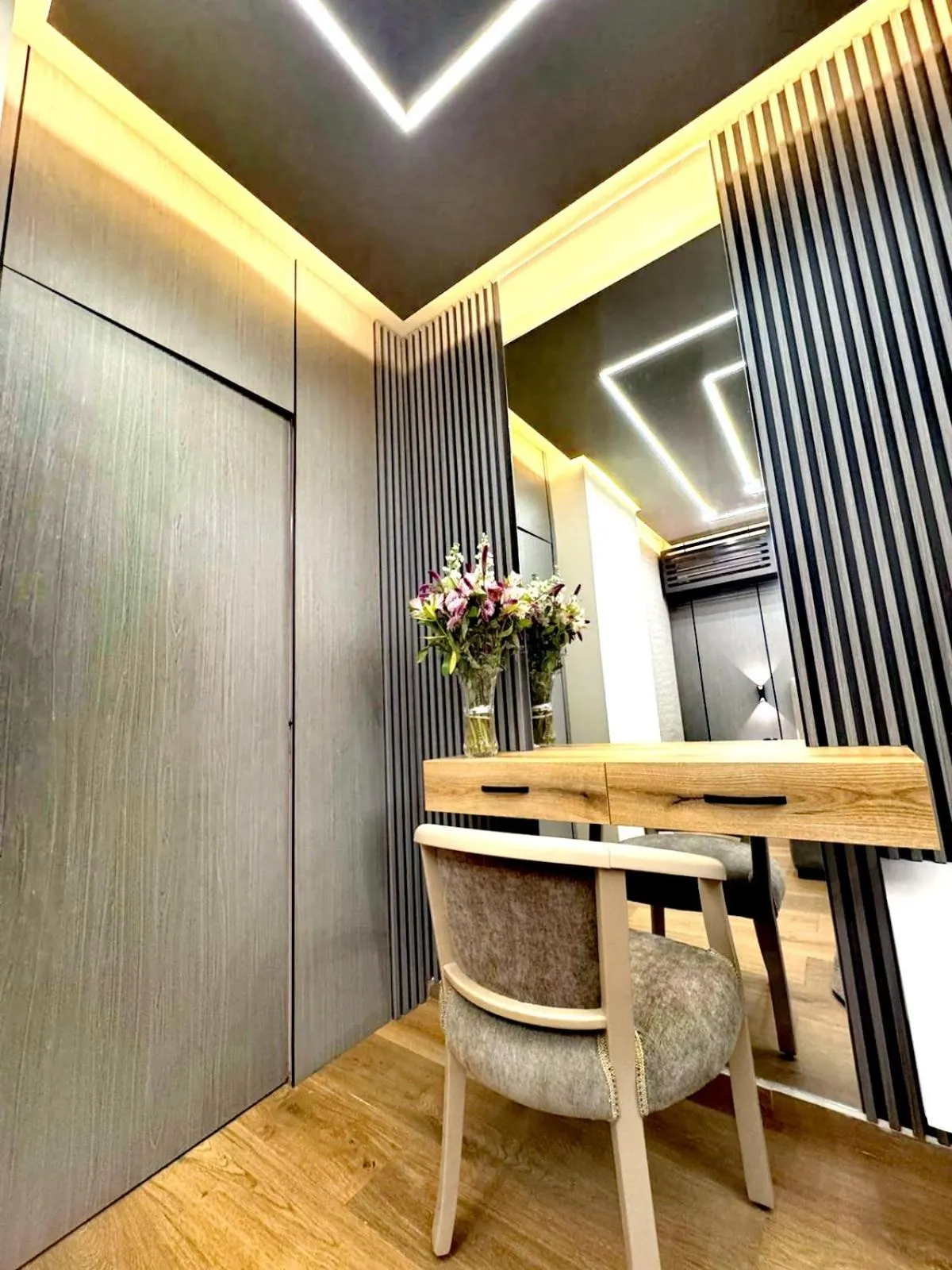 Bedroom in Queens Suite Hotel