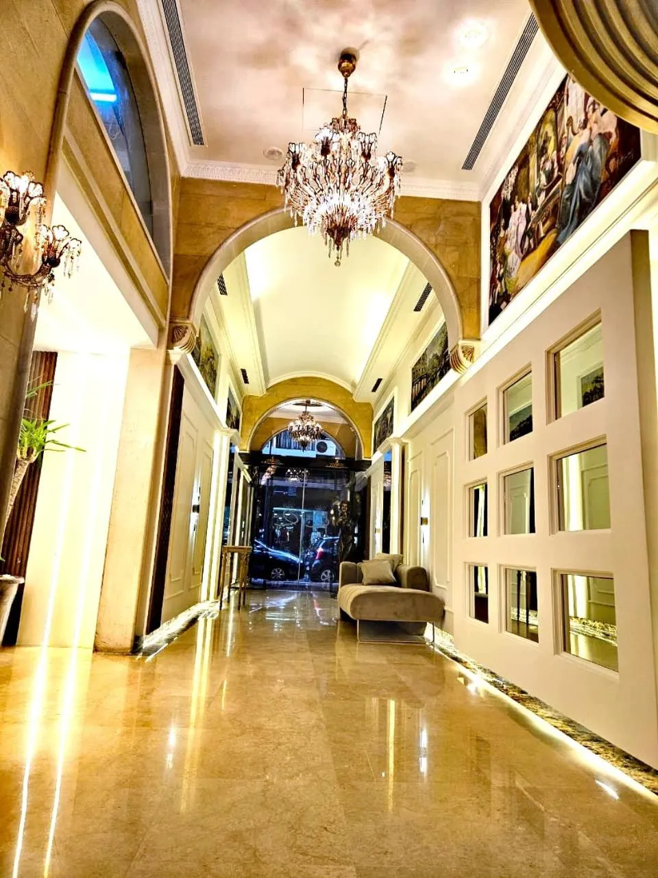 Lobby or reception in Queens Suite Hotel